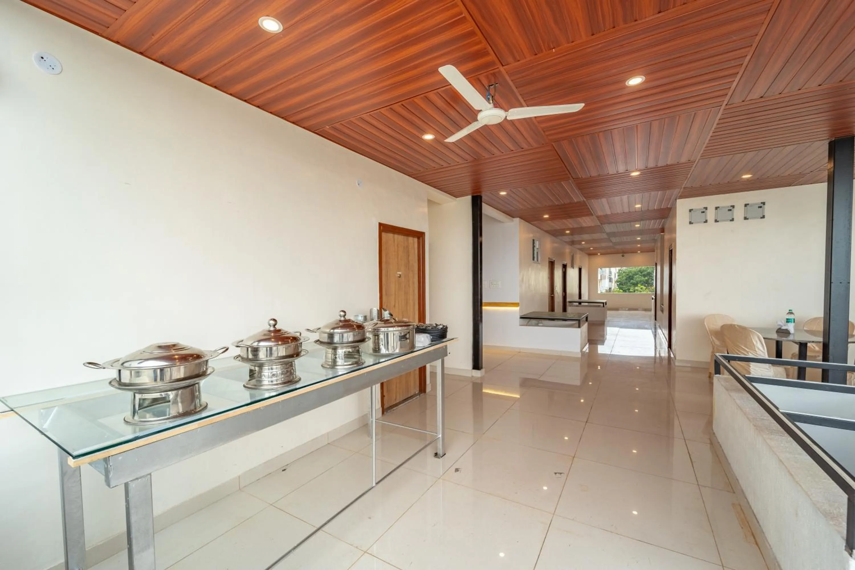 Kitchen or kitchenette in The Suites