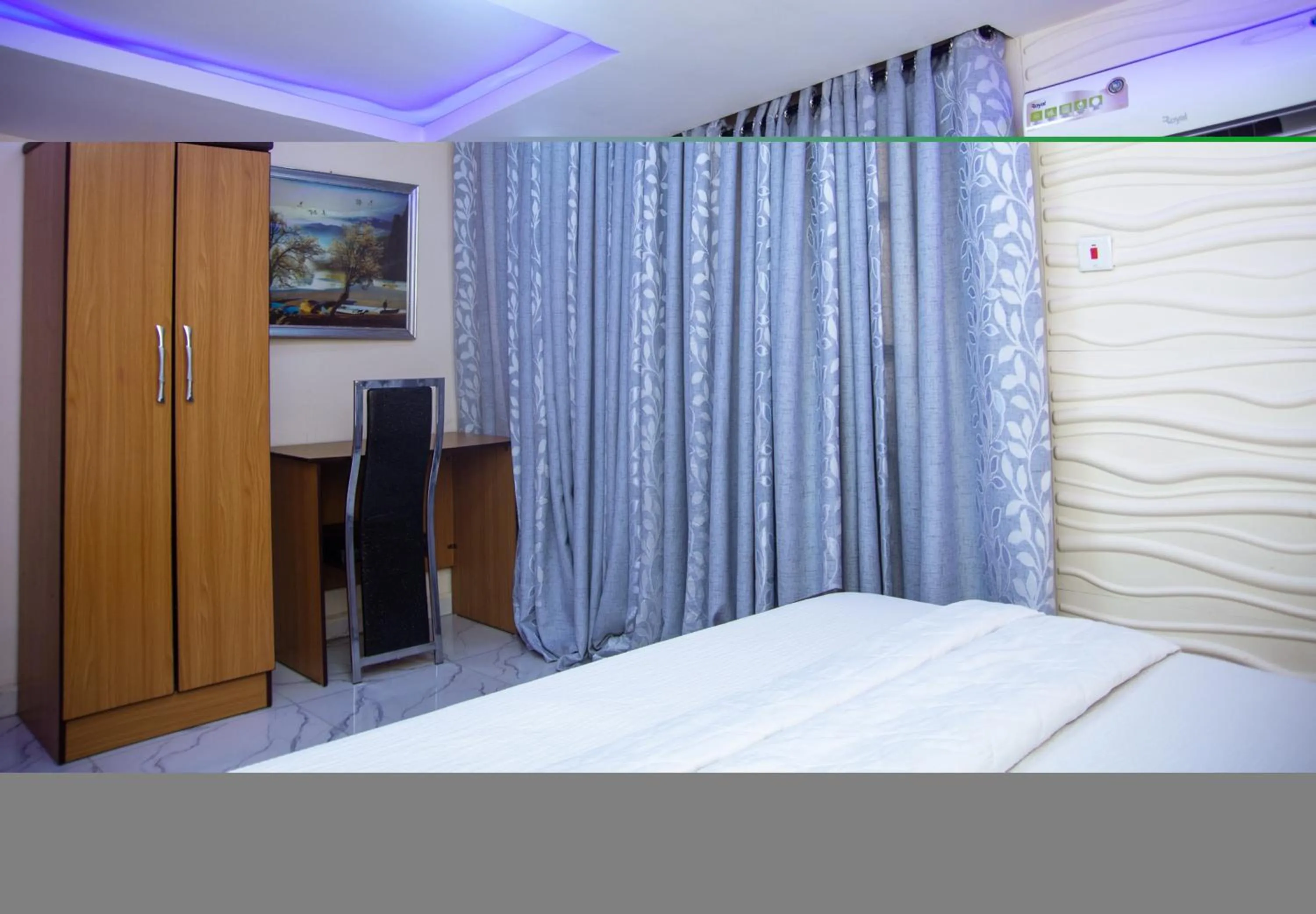 Bed in Haffy Executive Hotels and Suite