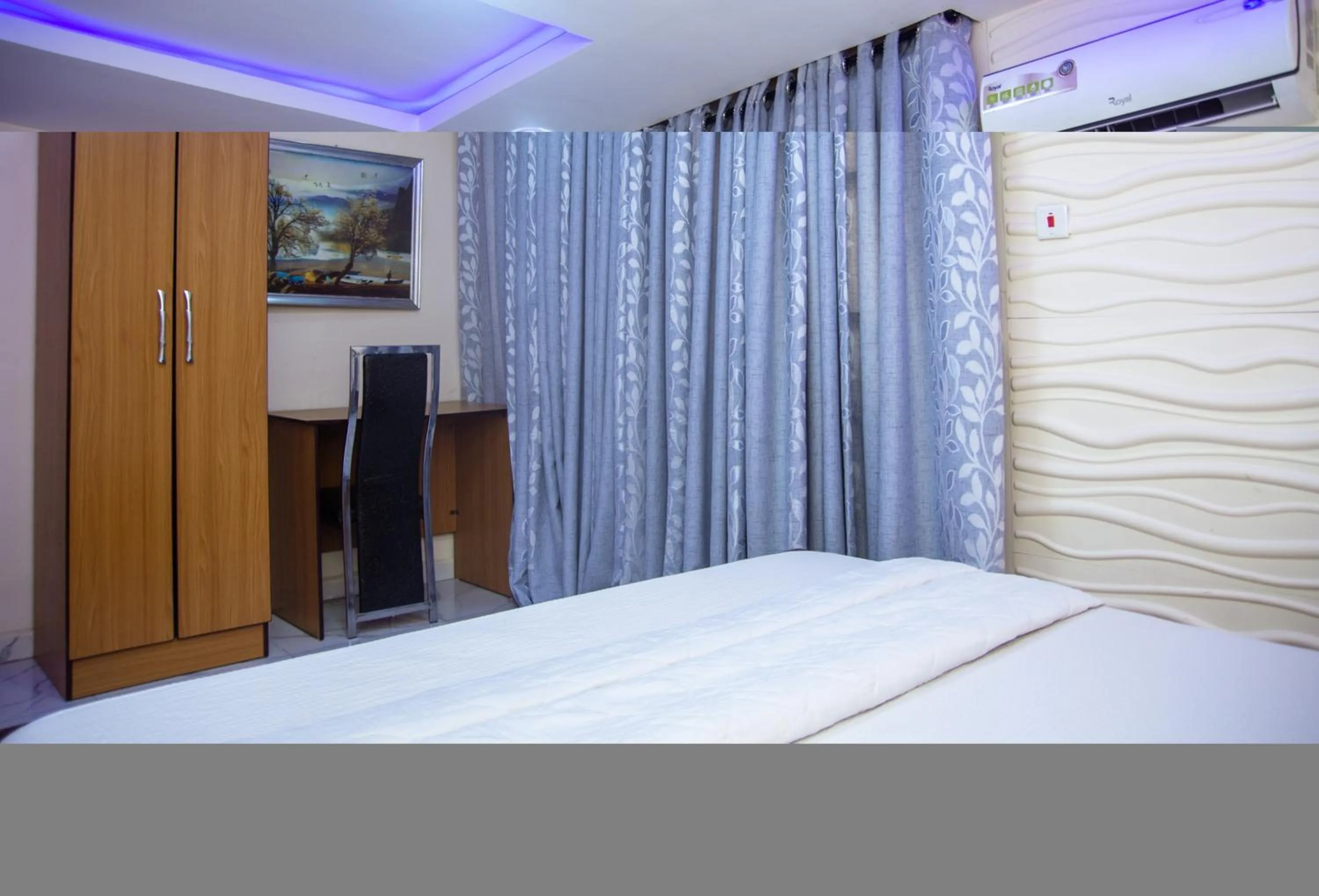 Bed in Haffy Executive Hotels and Suite