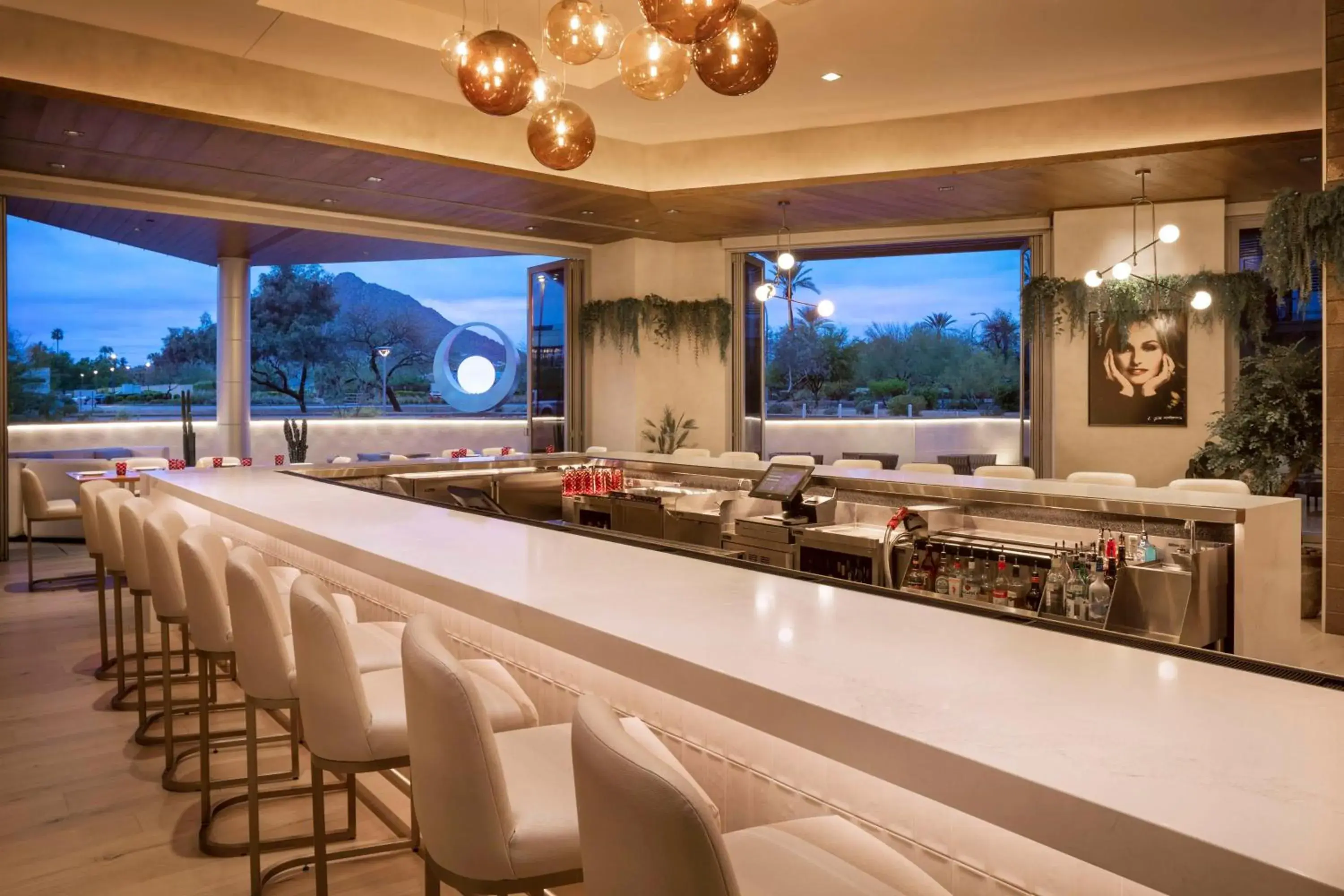 Lounge or bar in Caesars Republic Scottsdale, a Hilton Hotel Lounge or bar in Caesars Republic Scottsdale, a Hilton Hotel