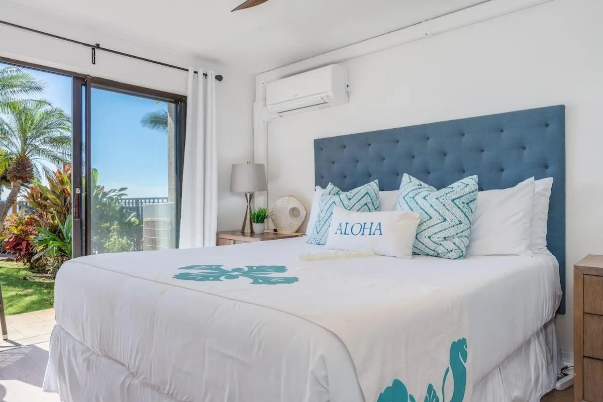 Bed in Lauloa 105 · LOA 105 2BD OceanFront Getaway w AC Pool