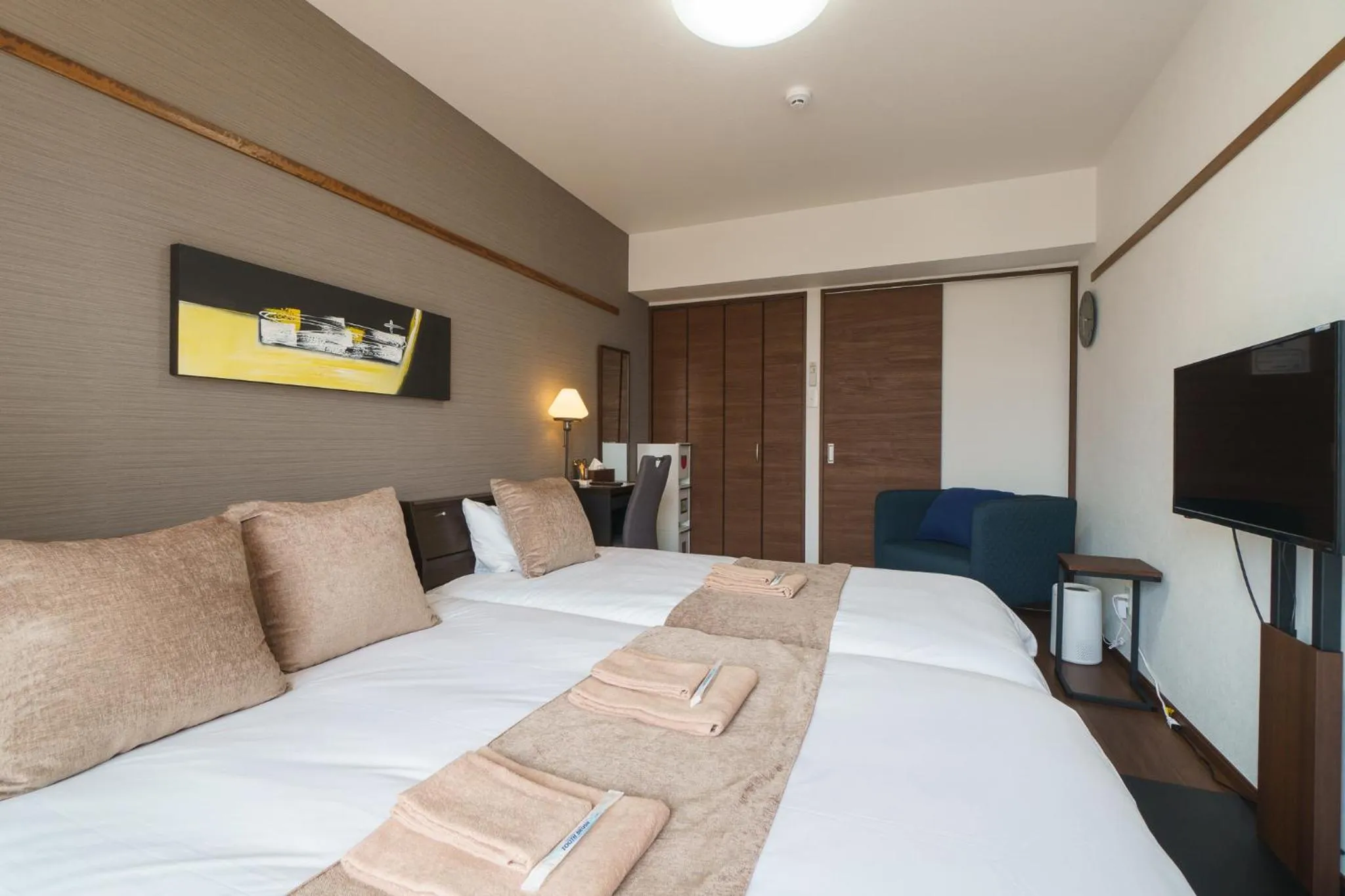 Bed in KINTARO Hotel Okinawa Naha