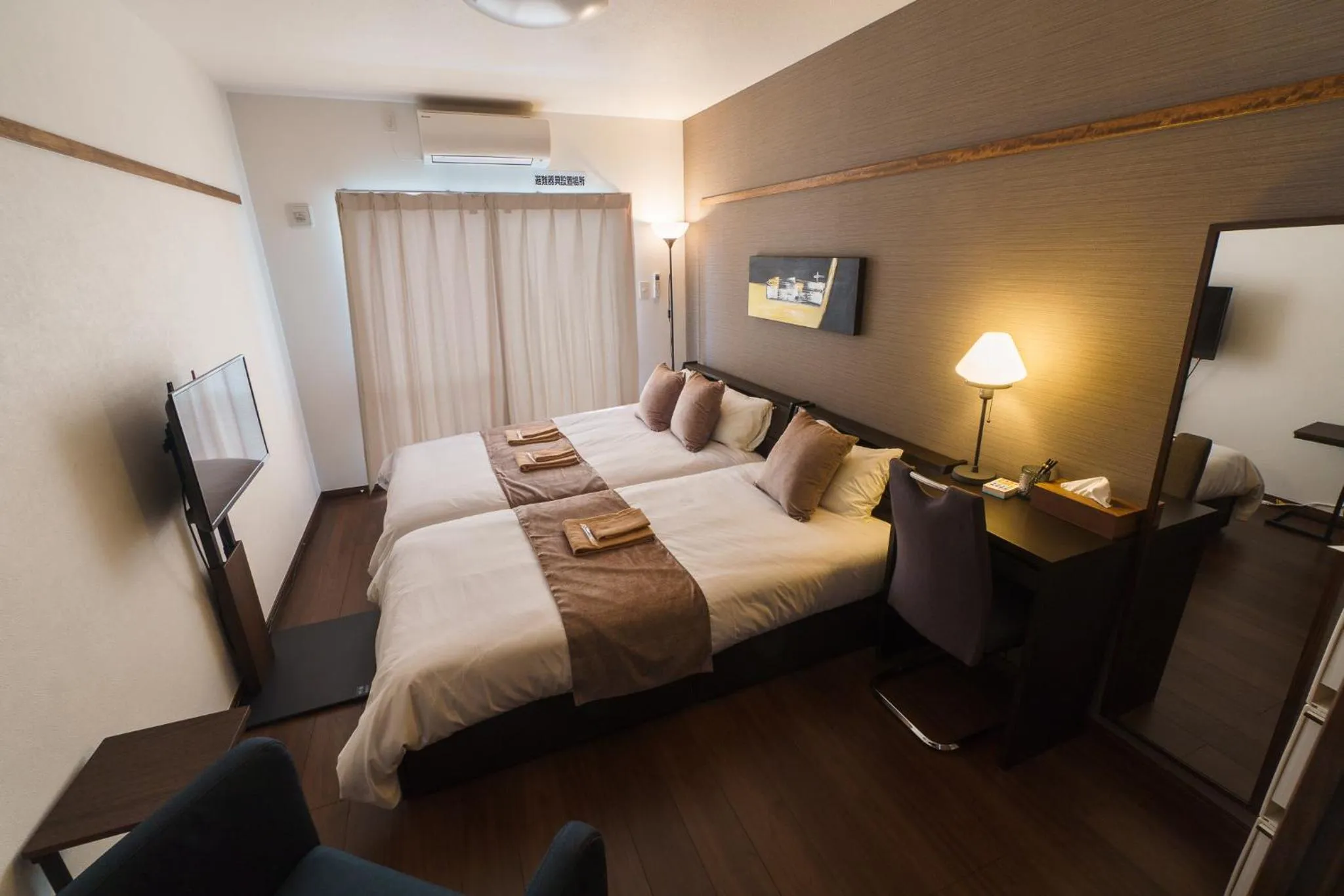 Bed in KINTARO Hotel Okinawa Naha