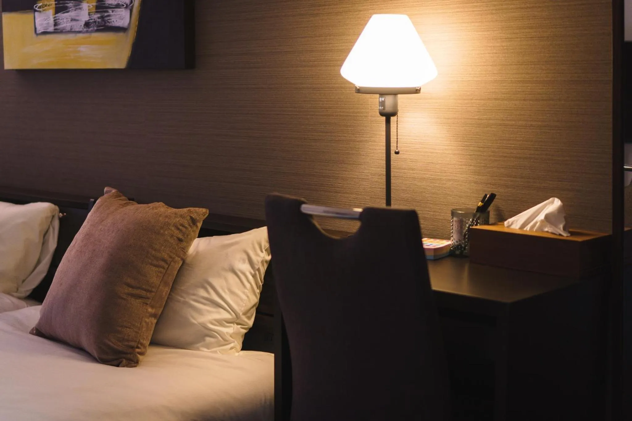 Bed in KINTARO Hotel Okinawa Naha