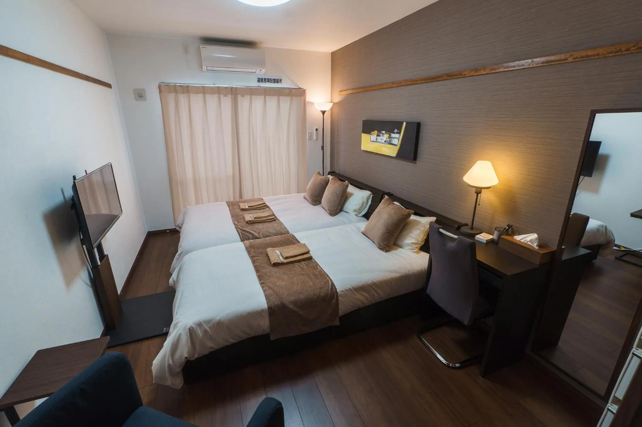 Bed in KINTARO Hotel Okinawa Naha