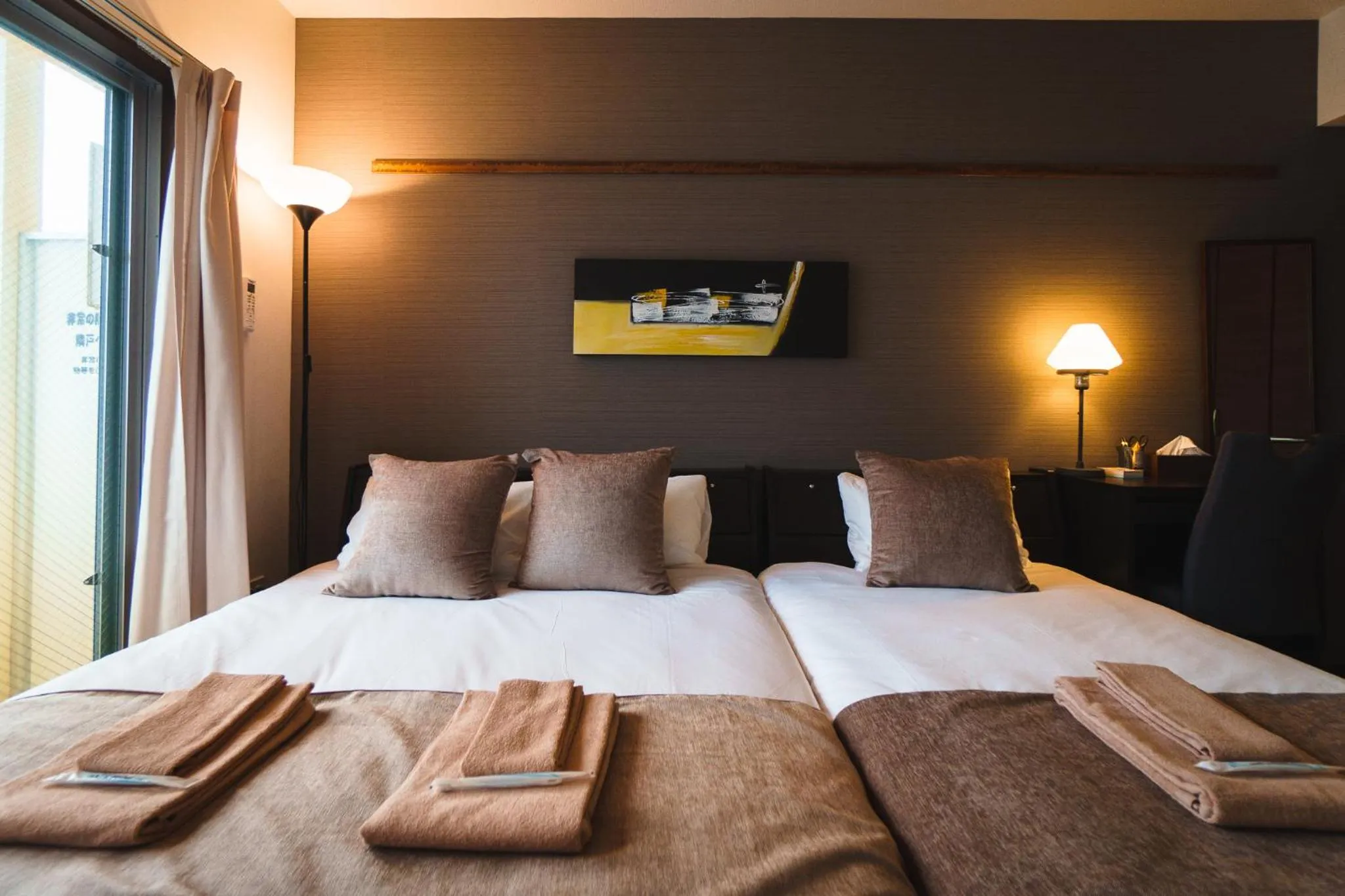 Bed in KINTARO Hotel Okinawa Naha