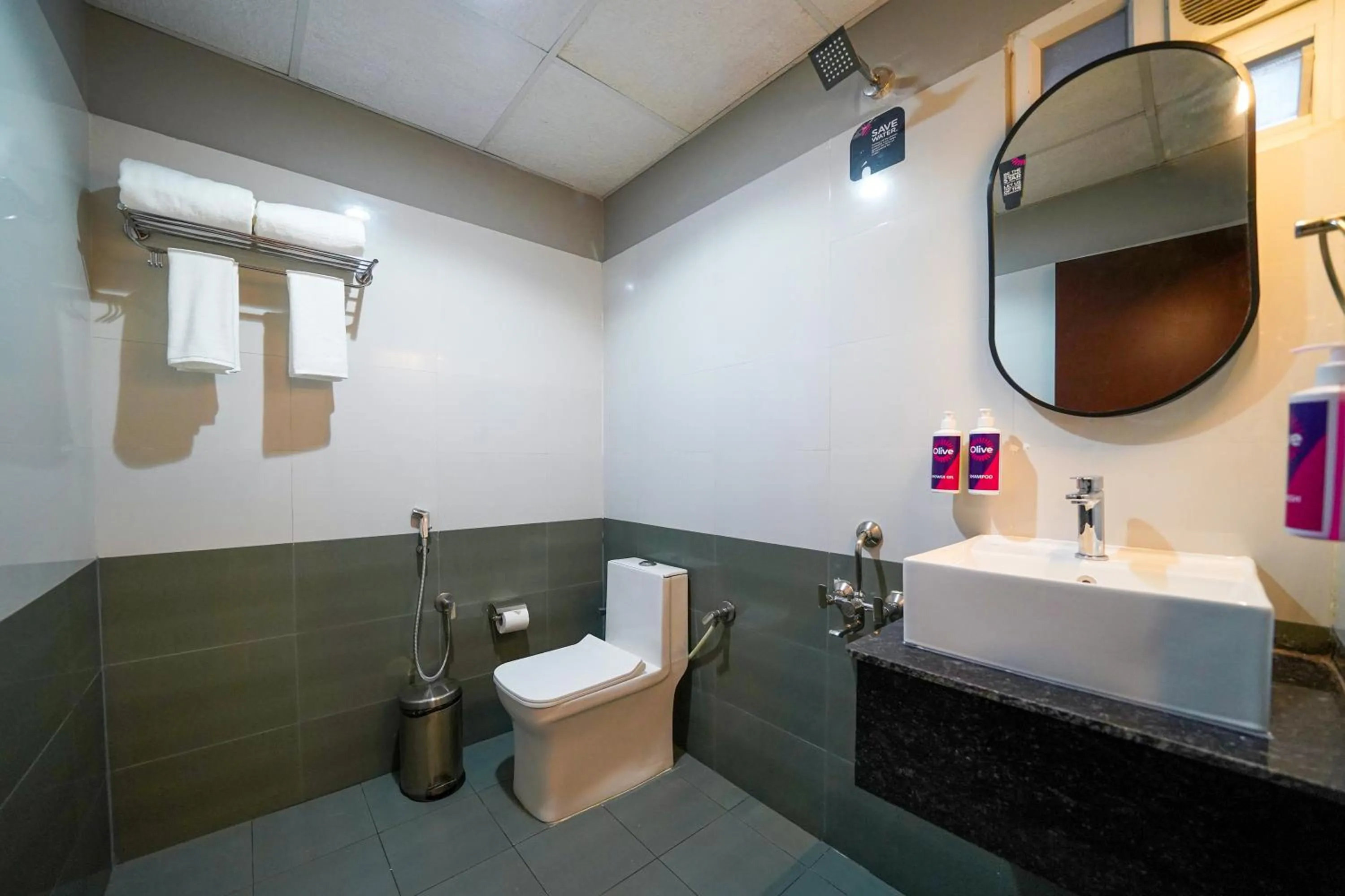 Shower in Olive Hotel Hosa Road Metro by Embassy Group