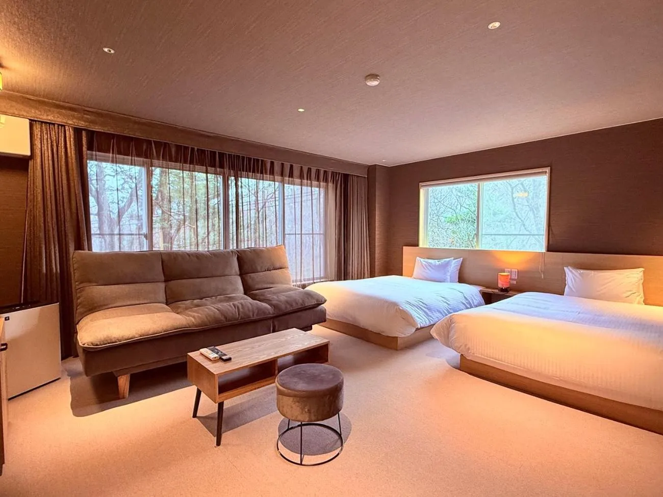 Living room, Bed in Resort Hotel RAKI House Nasu