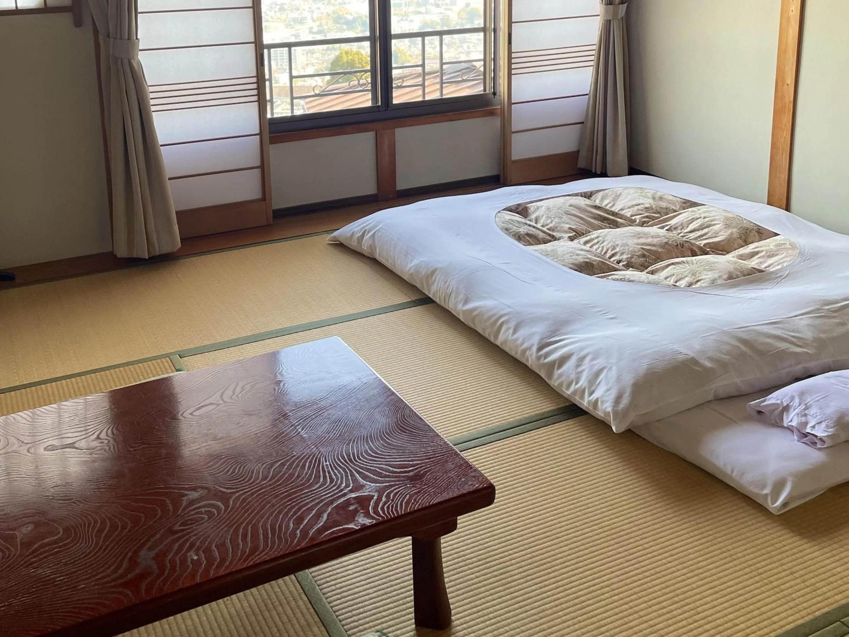 Photo of the whole room, Bed in Kanko Ryokan Yamato