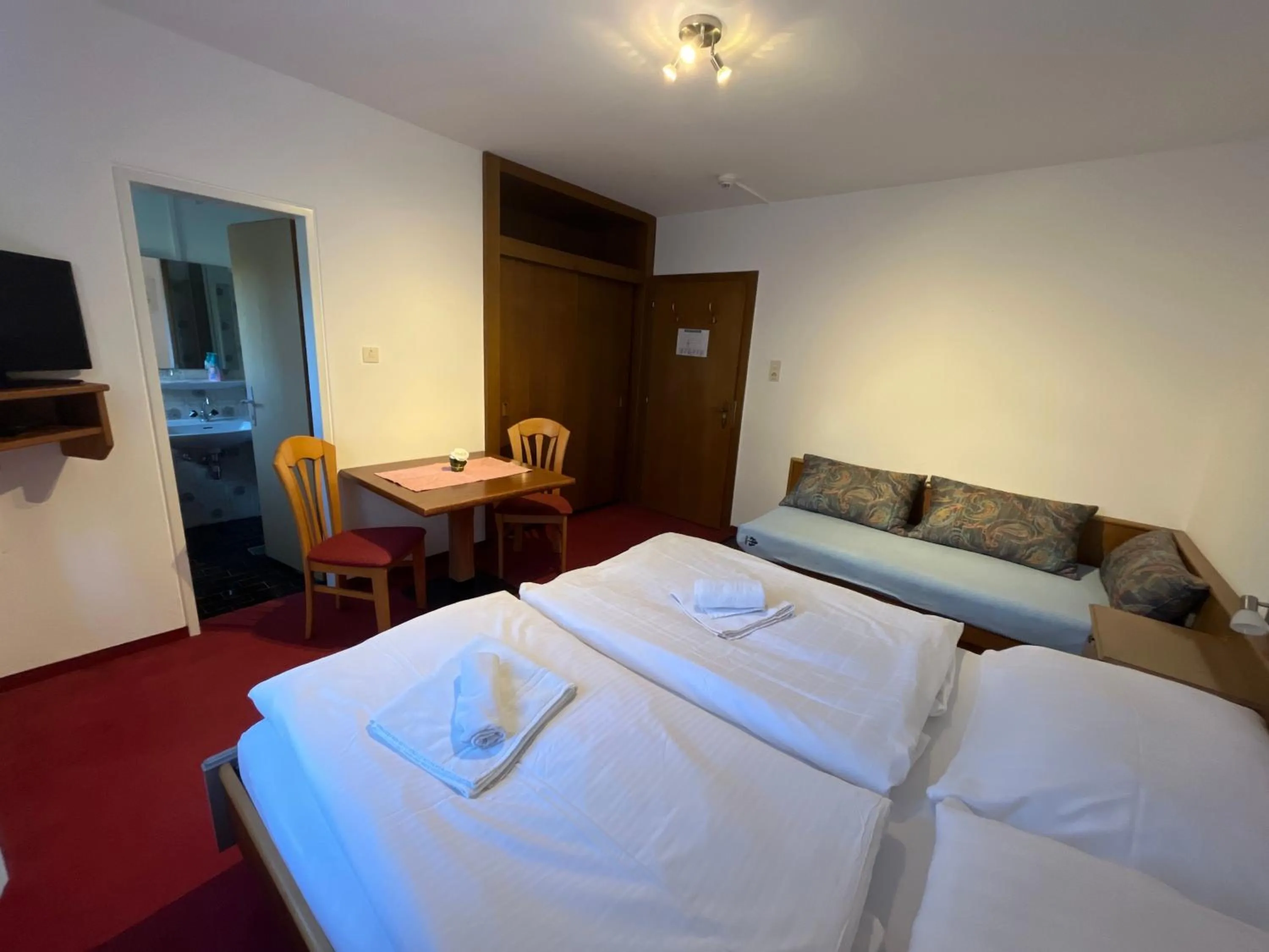 Bed in Pension Alpina