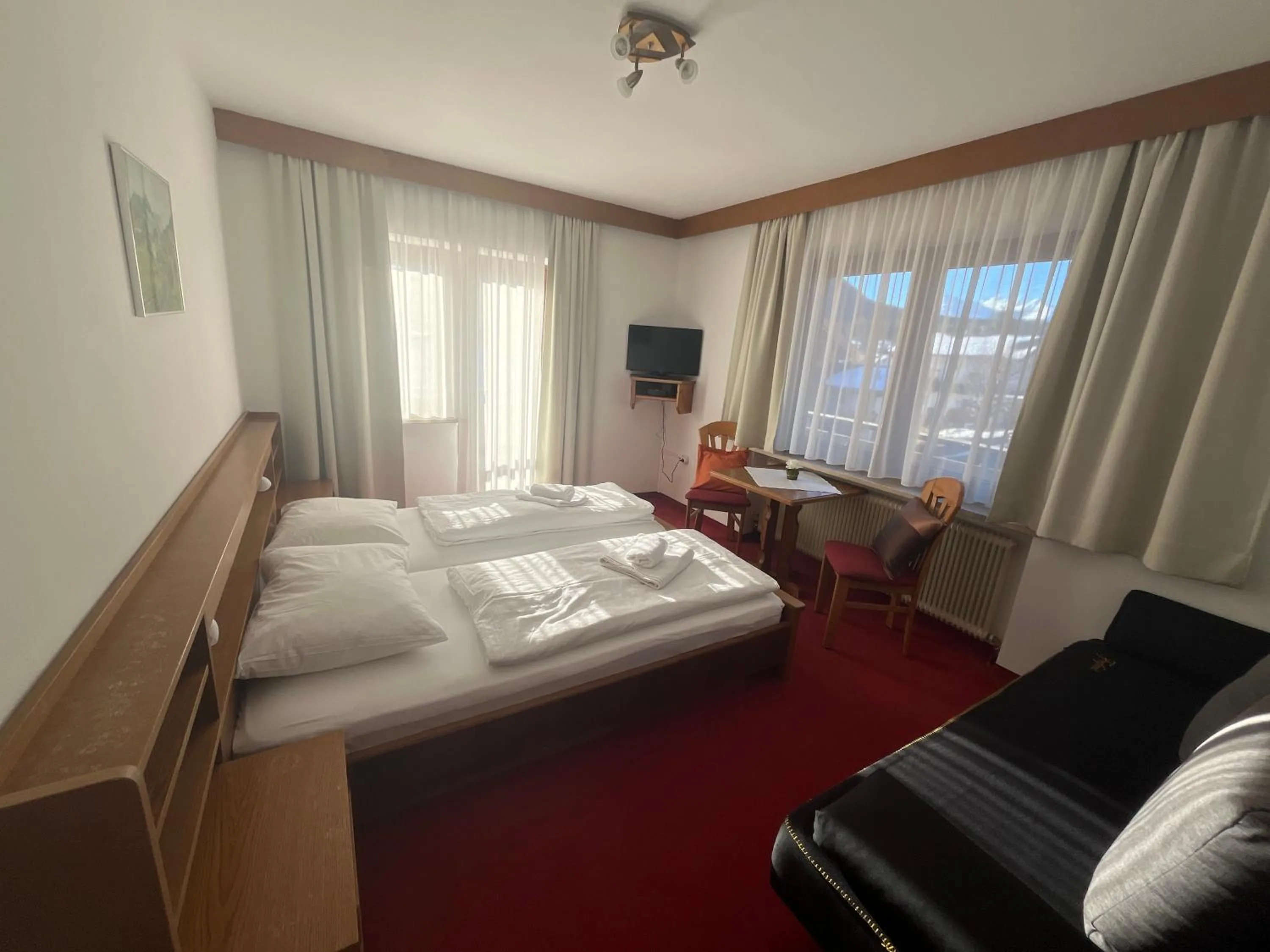 Bed in Pension Alpina