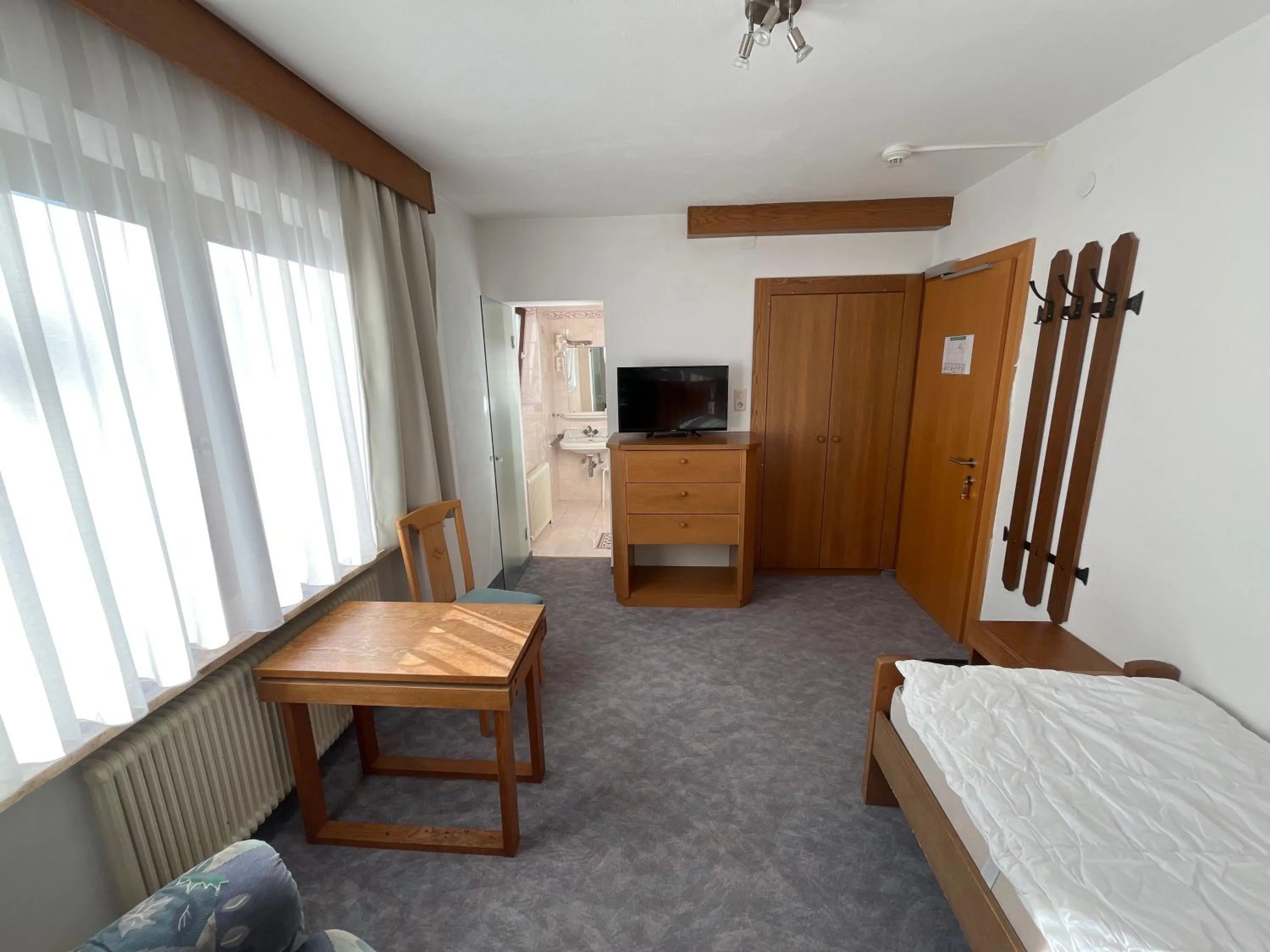 Bed in Pension Alpina