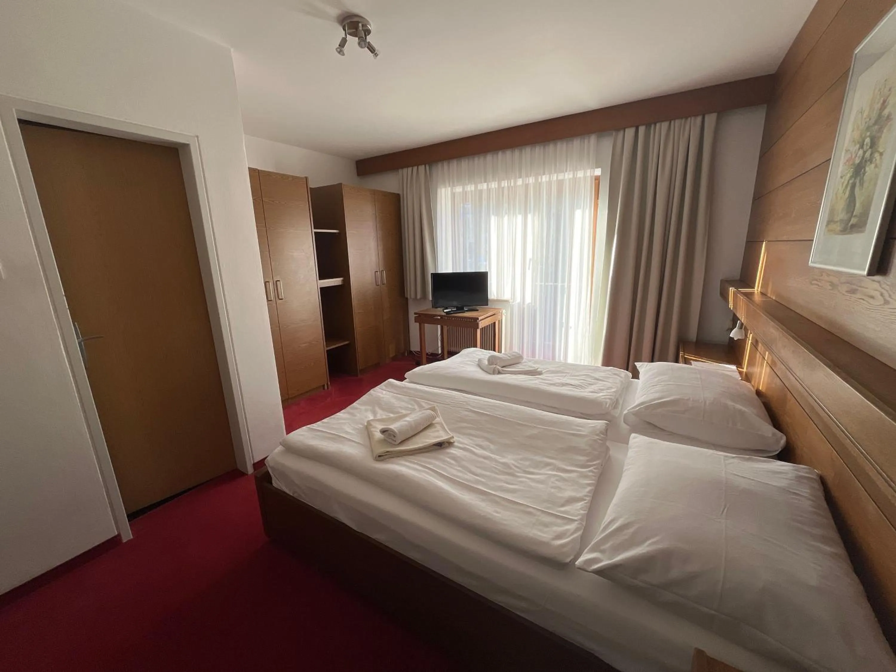 Bed in Pension Alpina