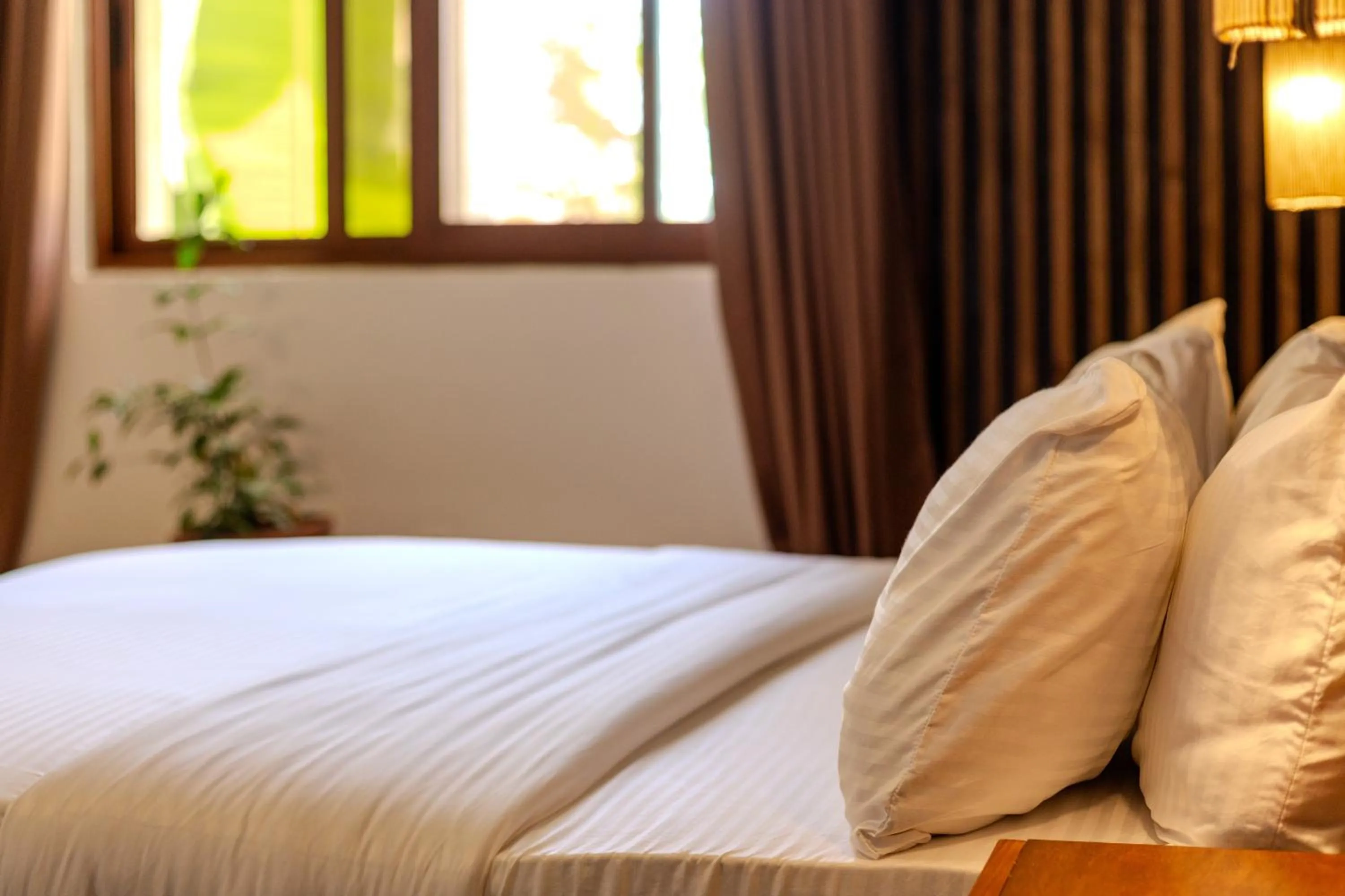 Bed in Tamarin Hôtel Cotonou