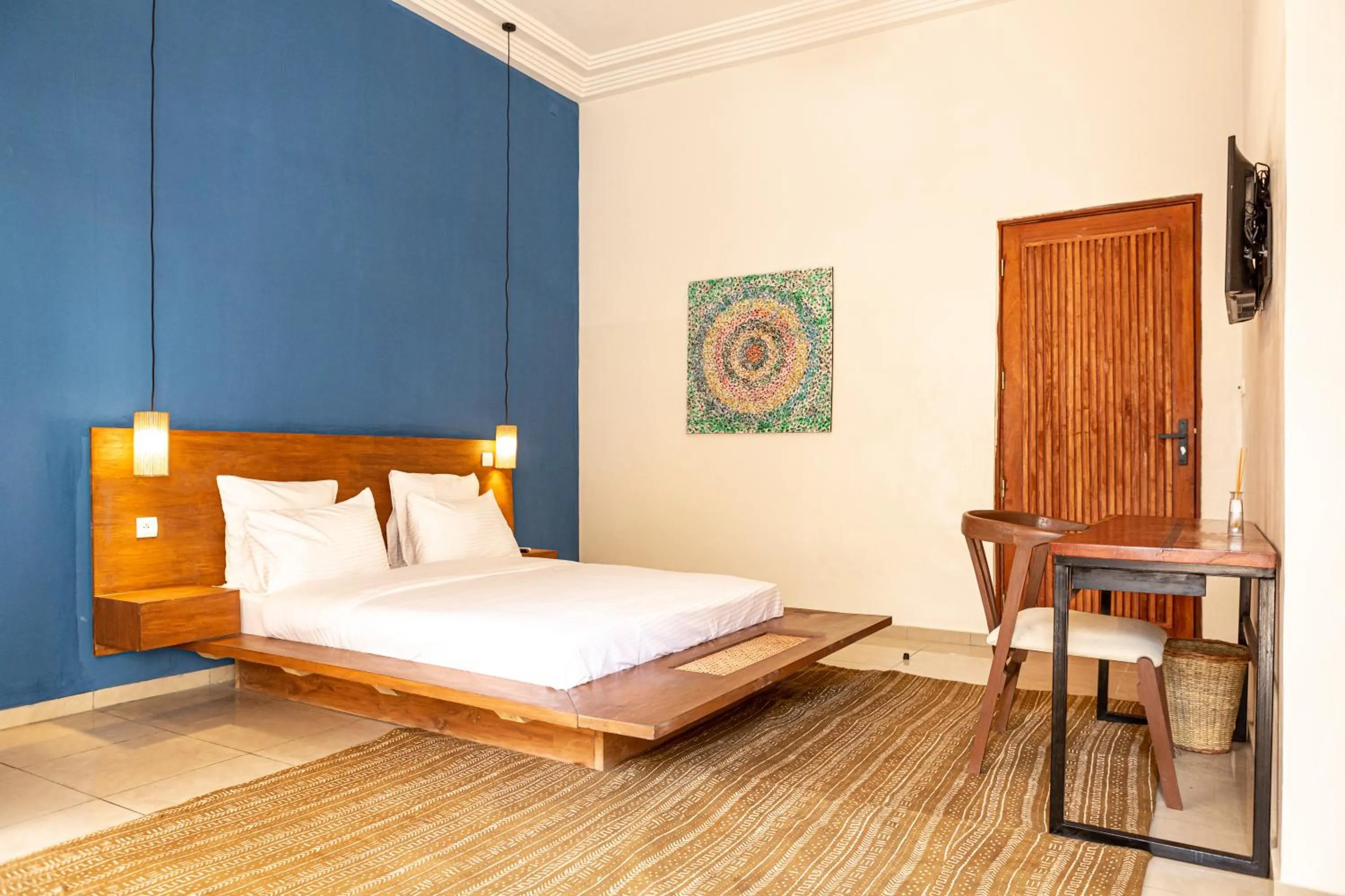 Bed in Tamarin Hôtel Cotonou