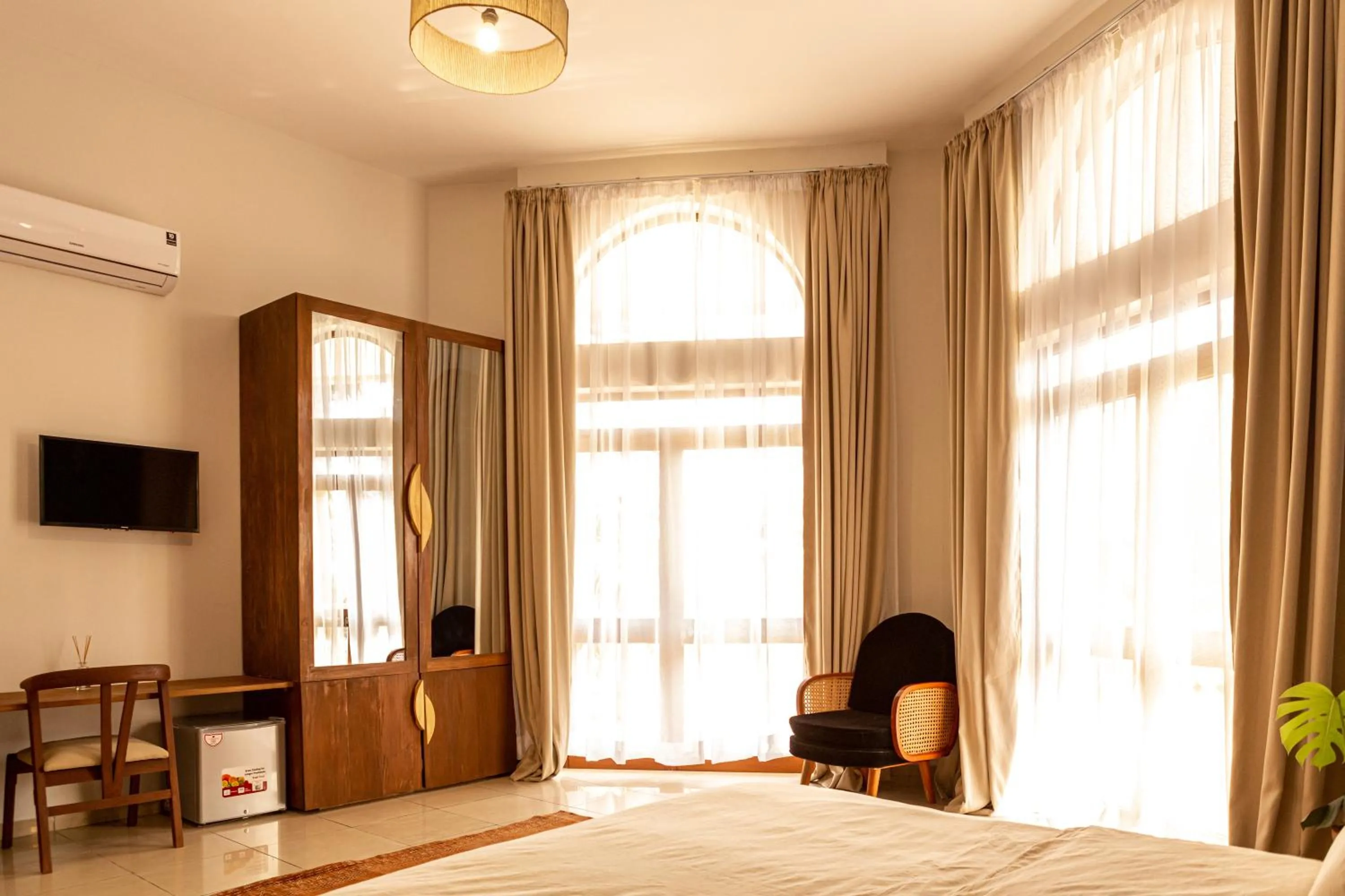 Bed in Tamarin Hôtel Cotonou