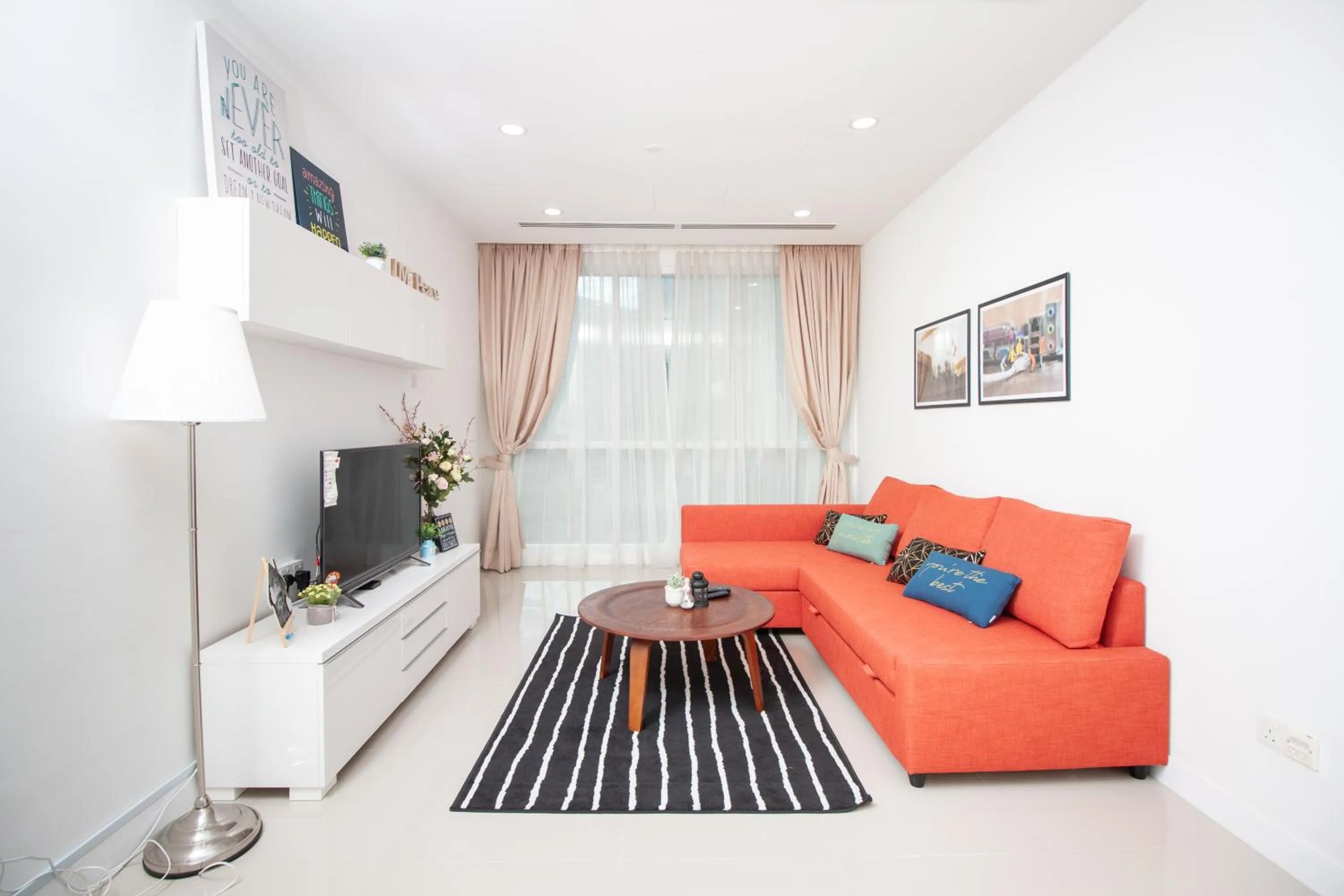 Living room in Binjai 8 by Plush