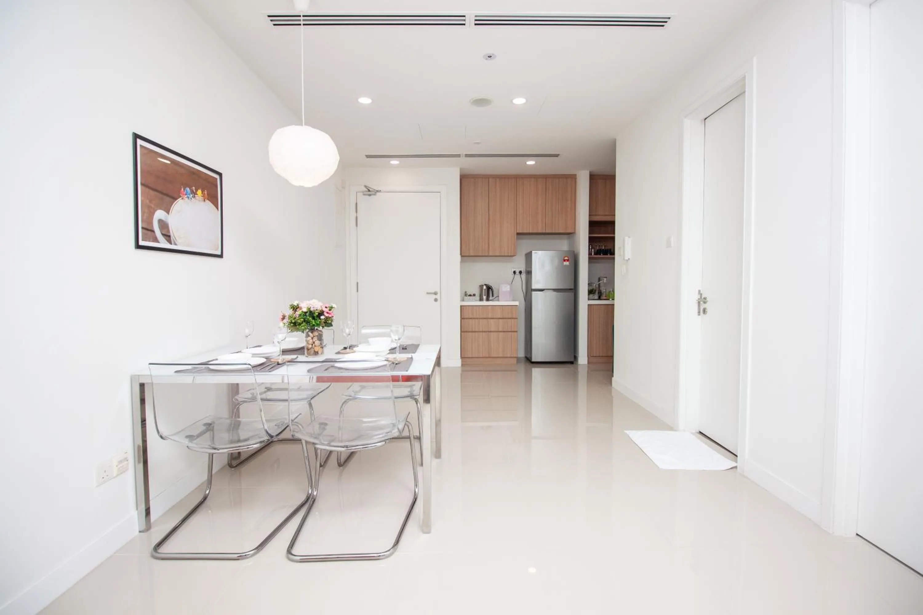Dining area in Binjai 8 by Plush