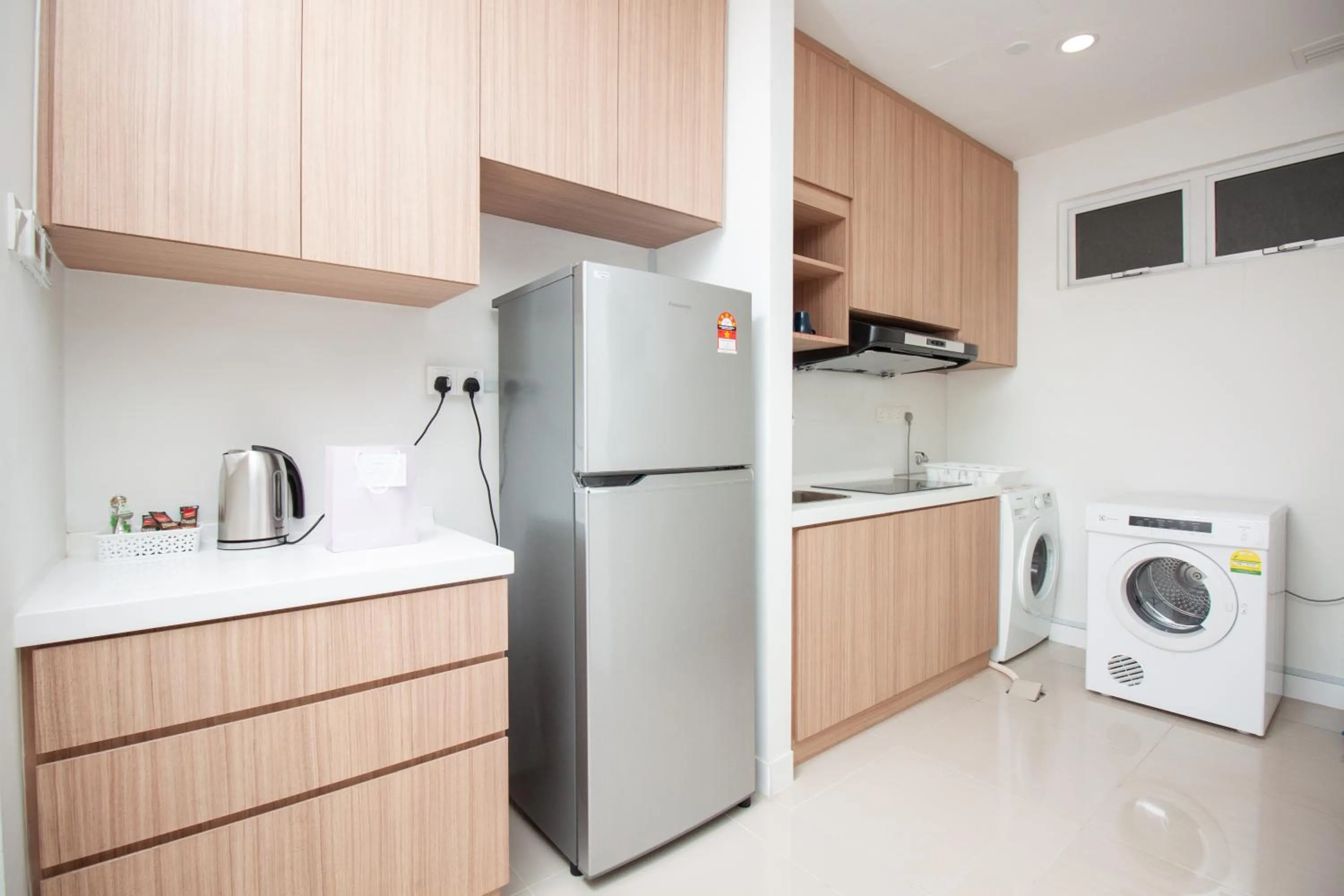 Kitchen or kitchenette in Binjai 8 by Plush