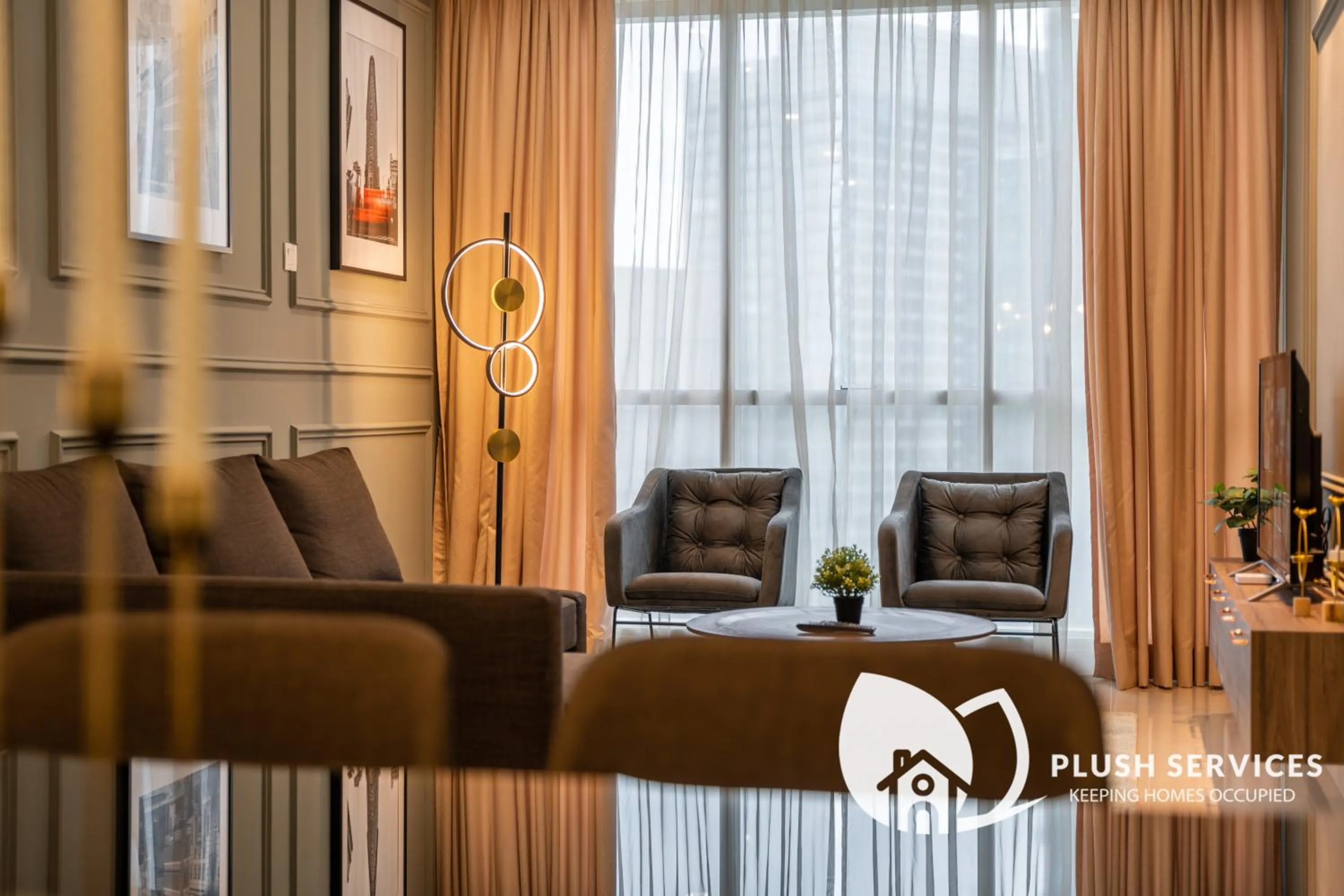 Living room in Binjai 8 by Plush