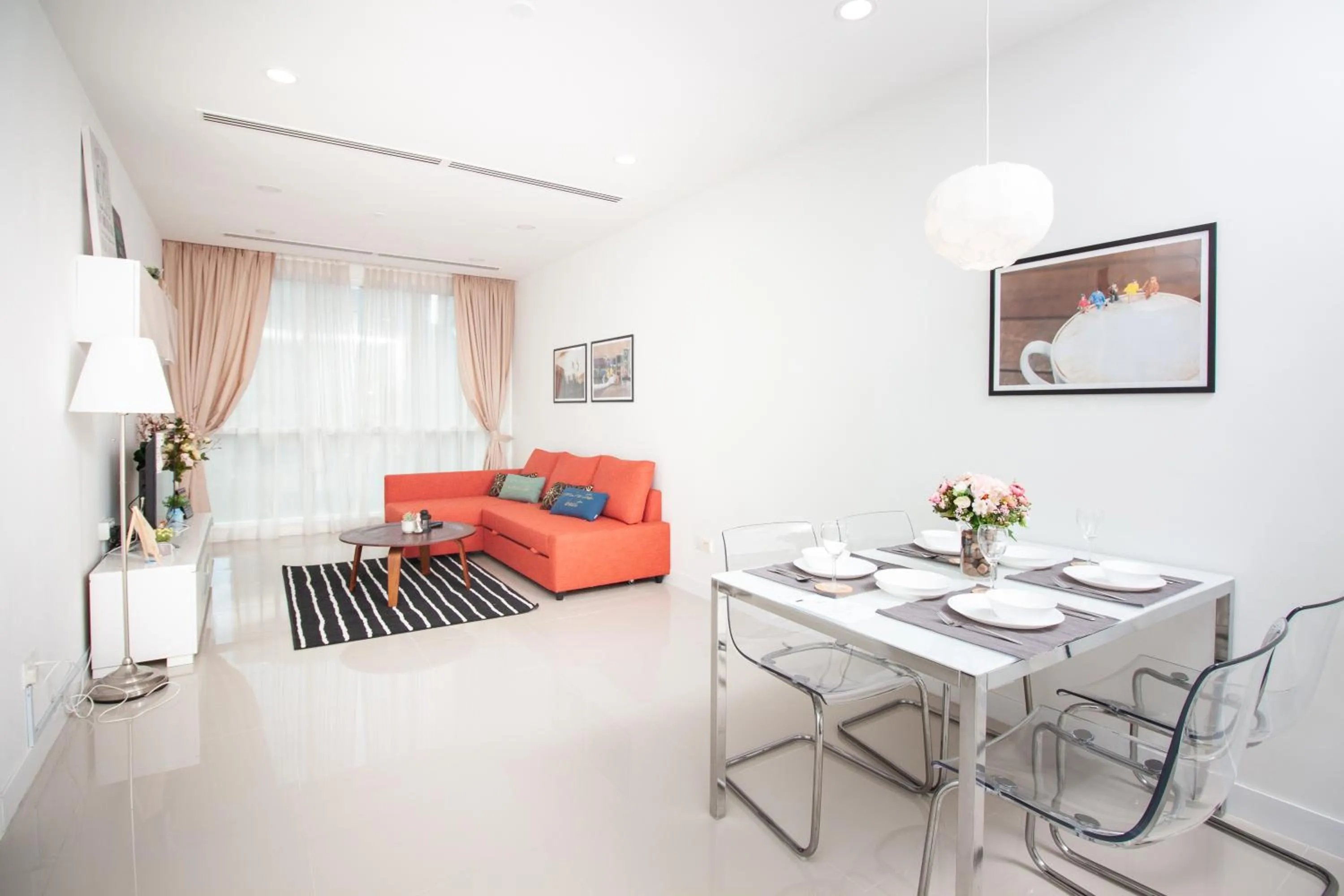 Living room in Binjai 8 by Plush