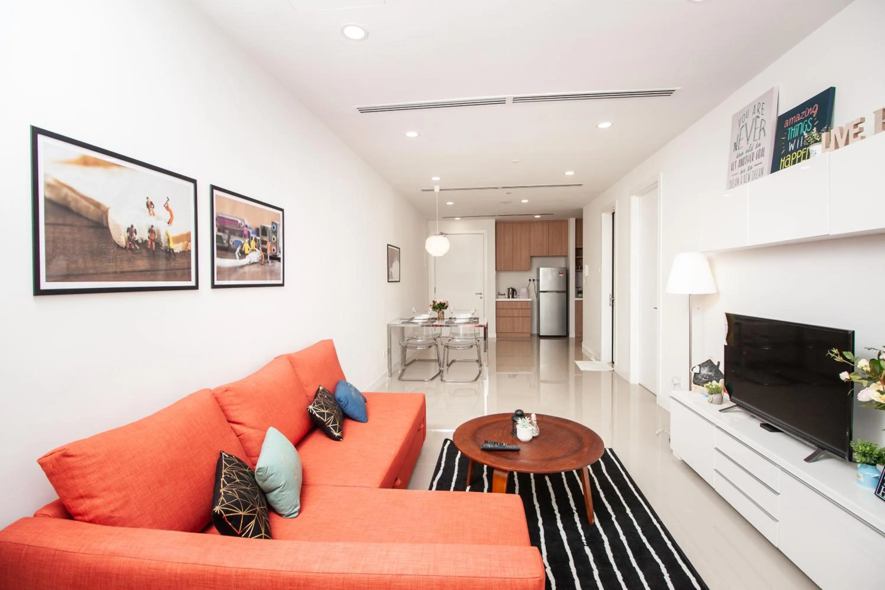 Living room in Binjai 8 by Plush