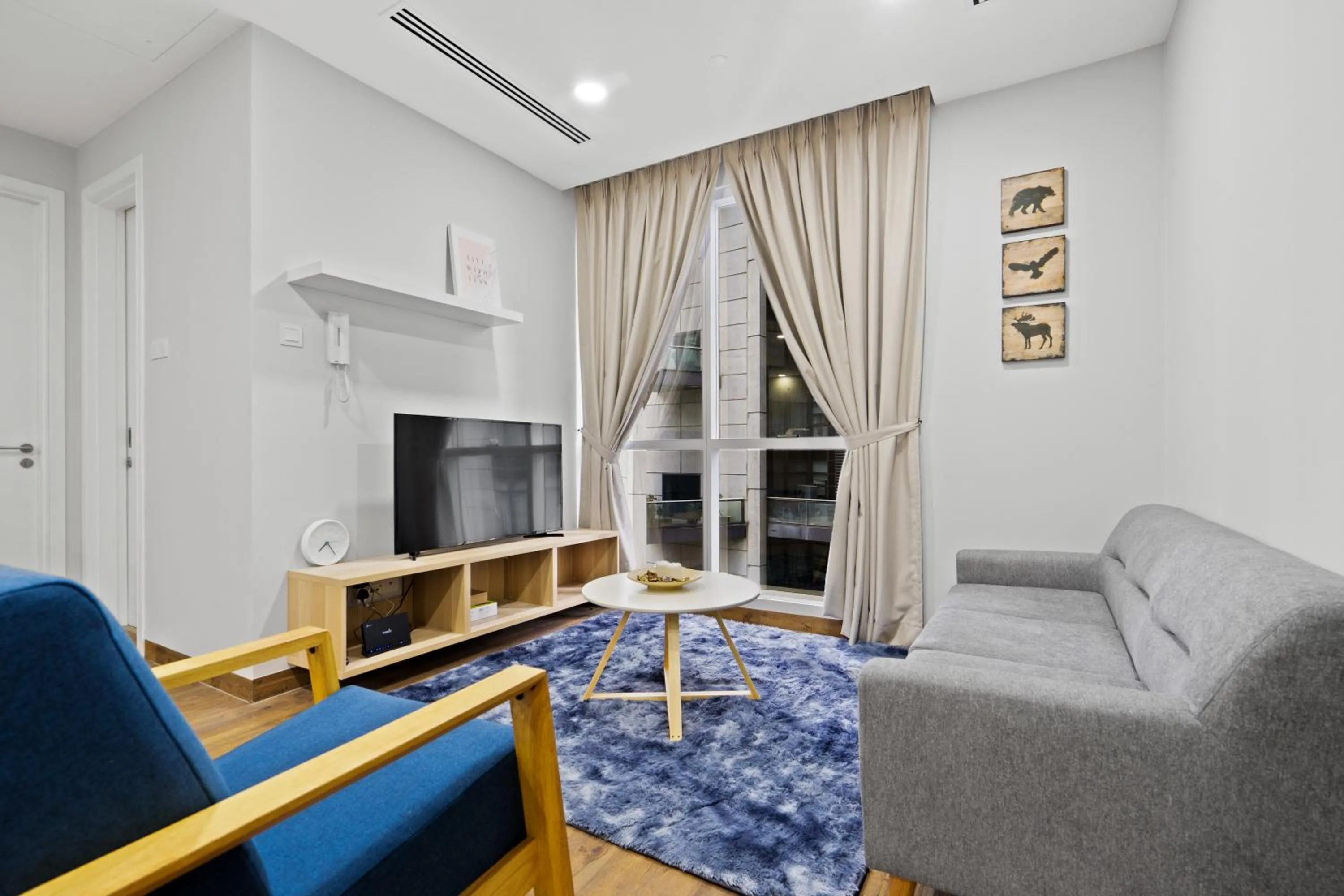 Living room in Binjai 8 by Plush