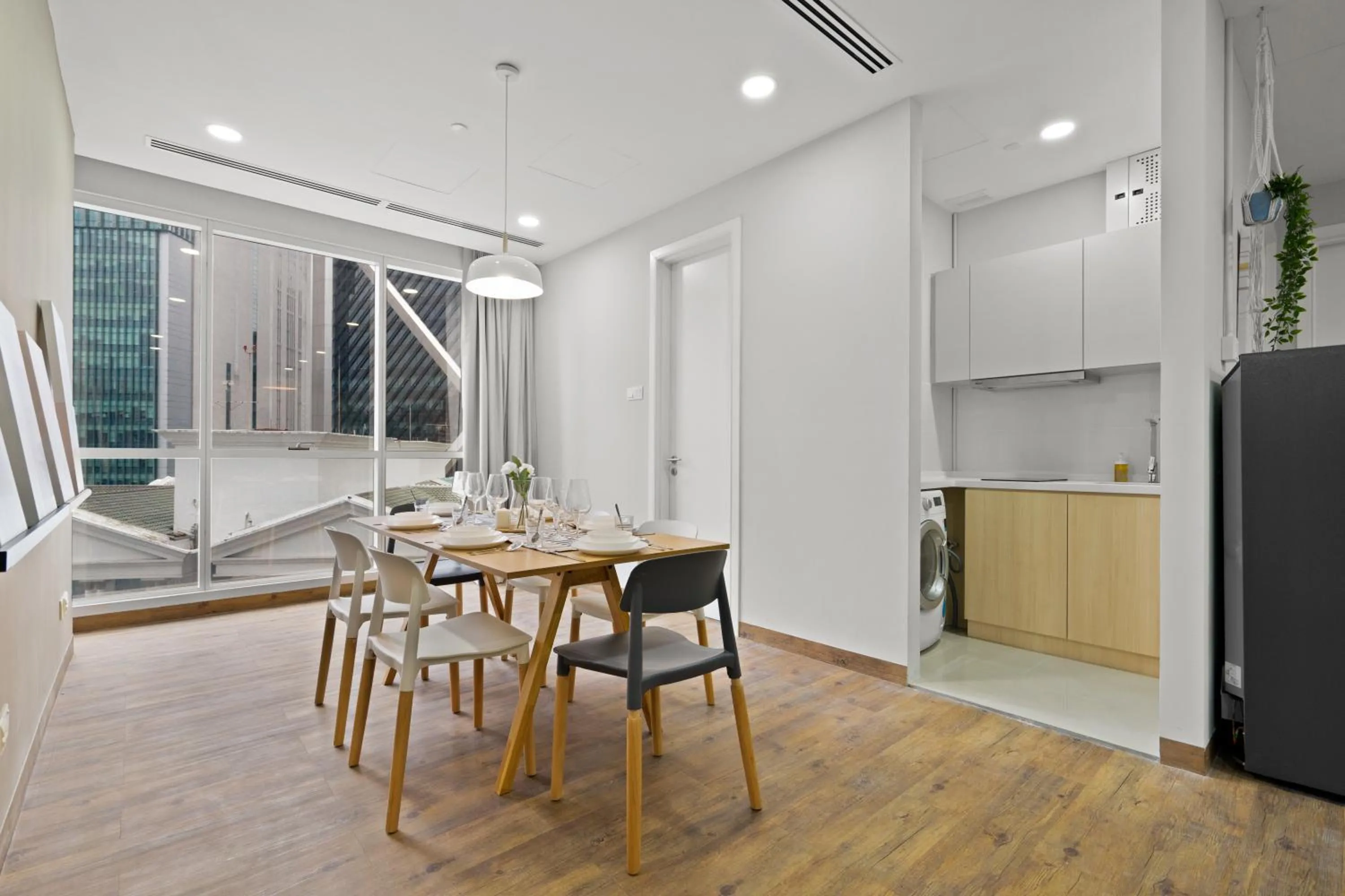 Dining area in Binjai 8 by Plush
