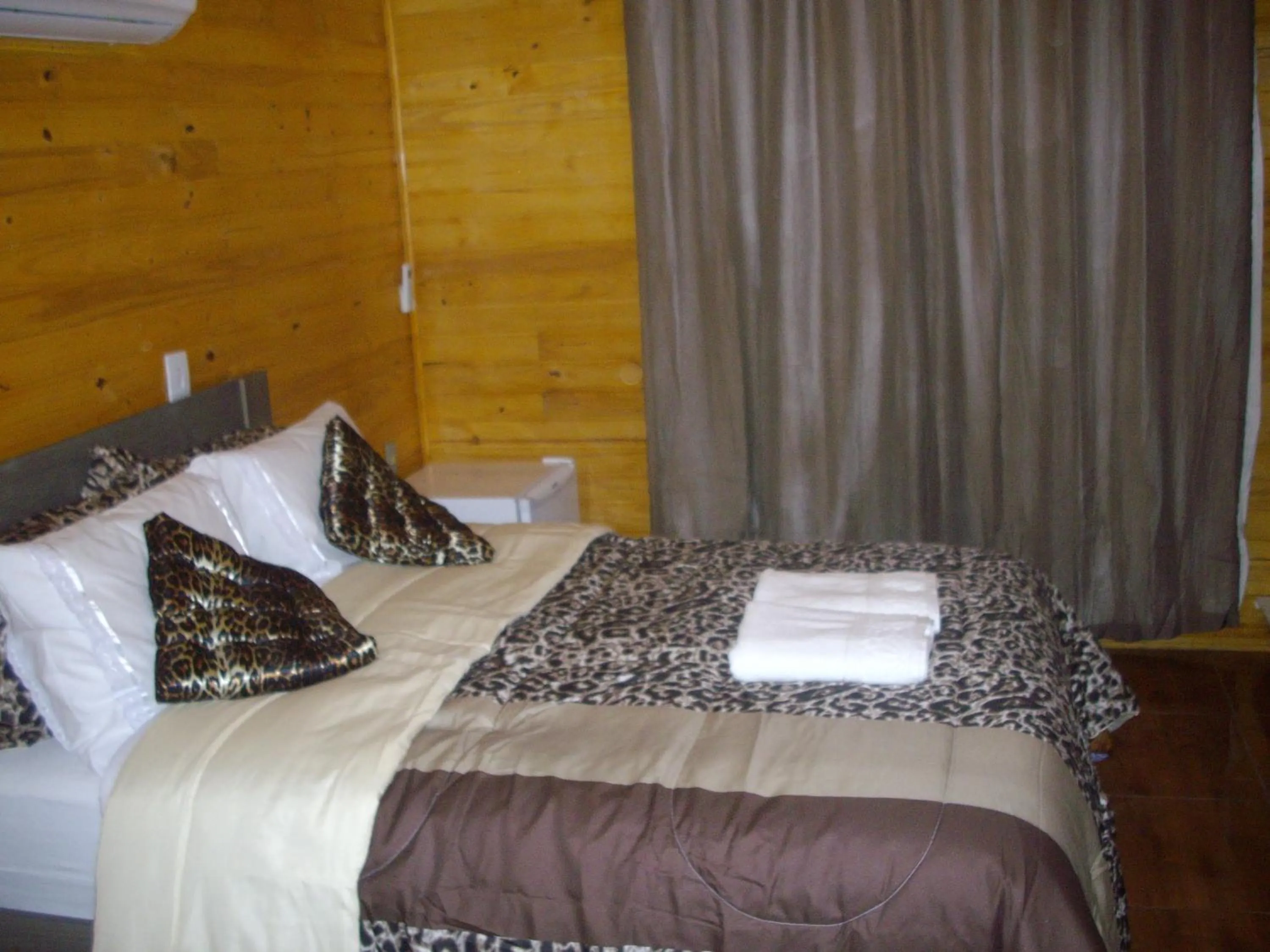 Bed in Pousada Cristal Serra