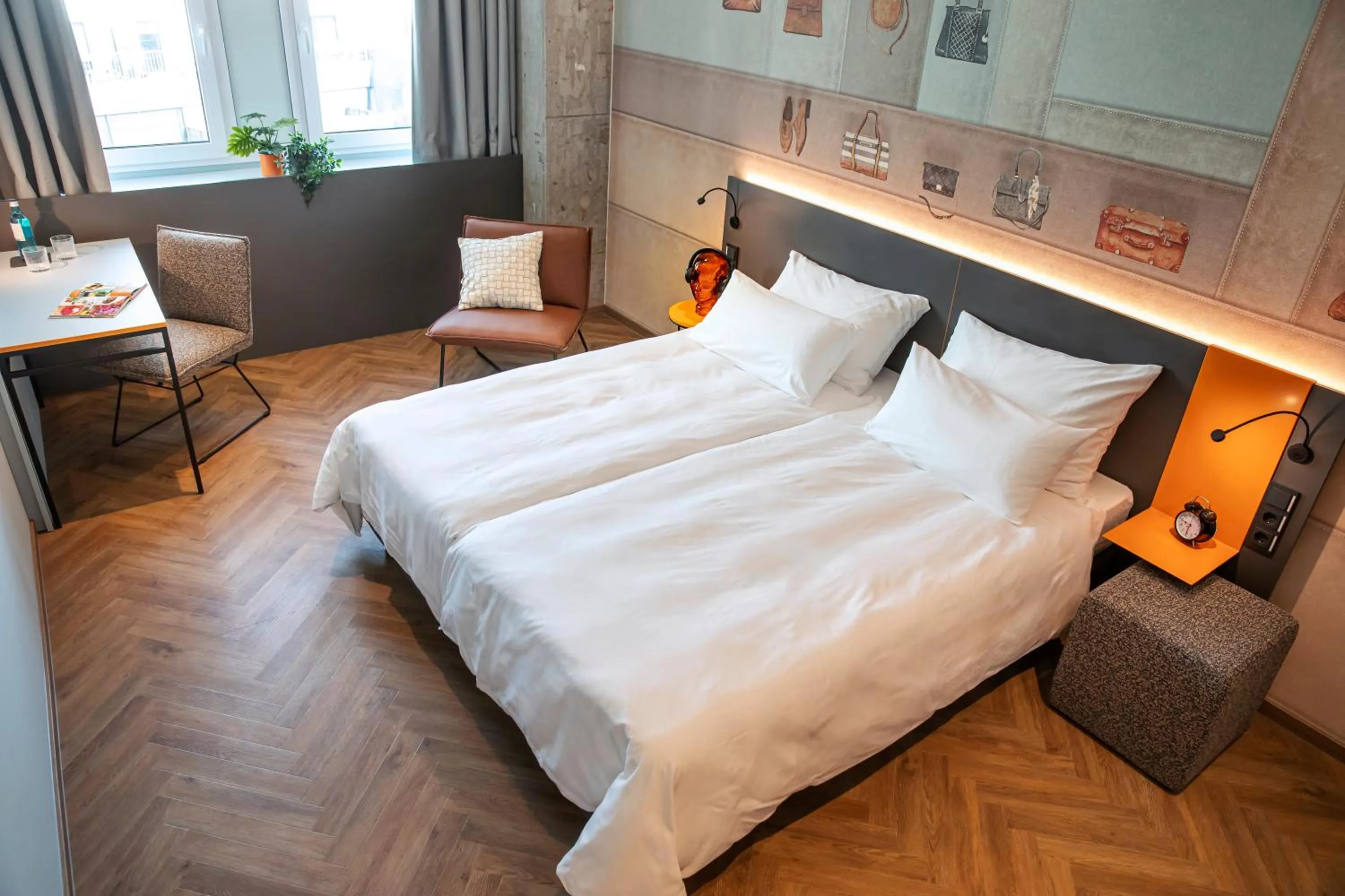 Photo of the whole room, Bed in LOGINN Hotel Offenbach