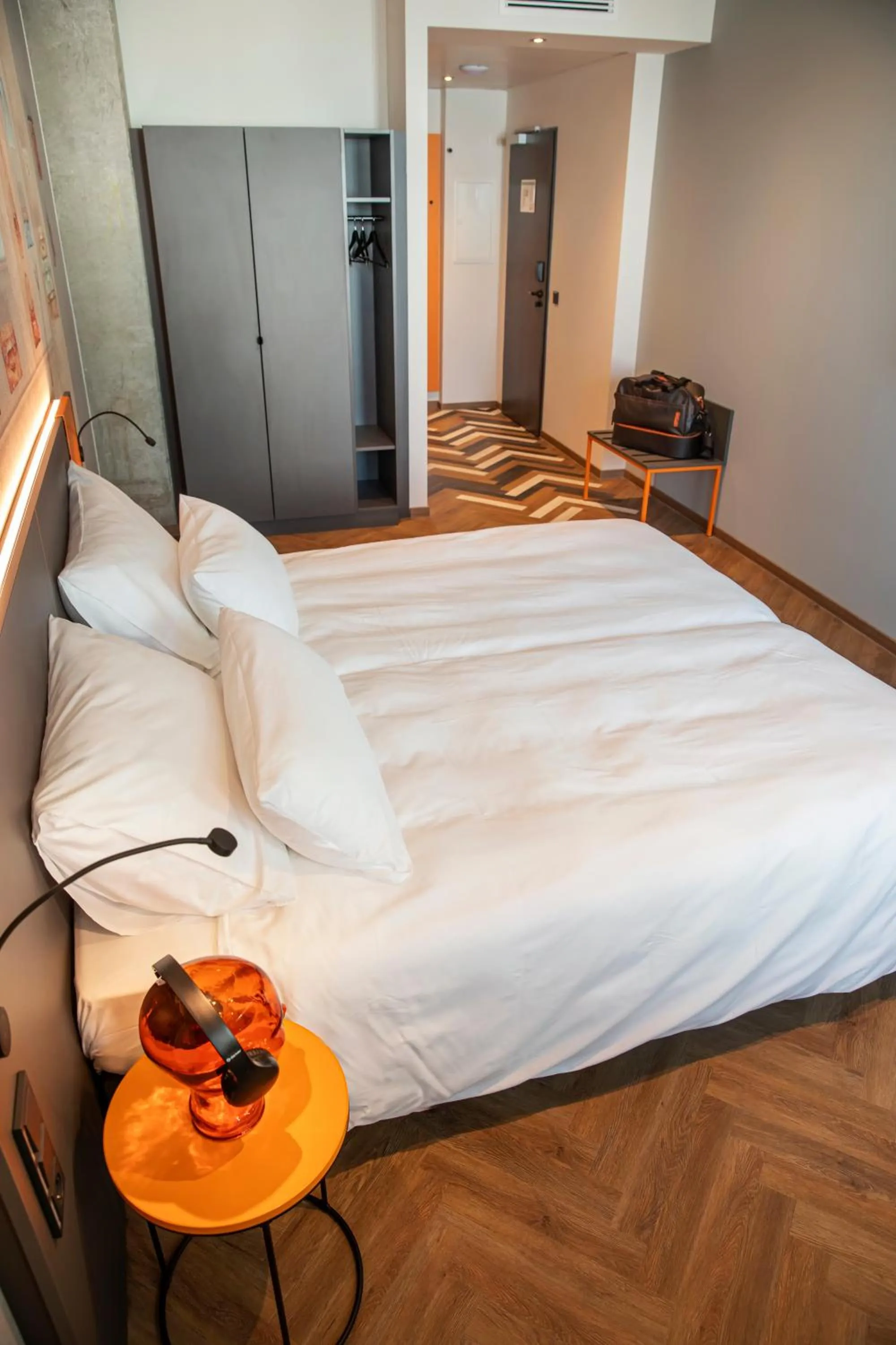 Photo of the whole room, Bed in LOGINN Hotel Offenbach