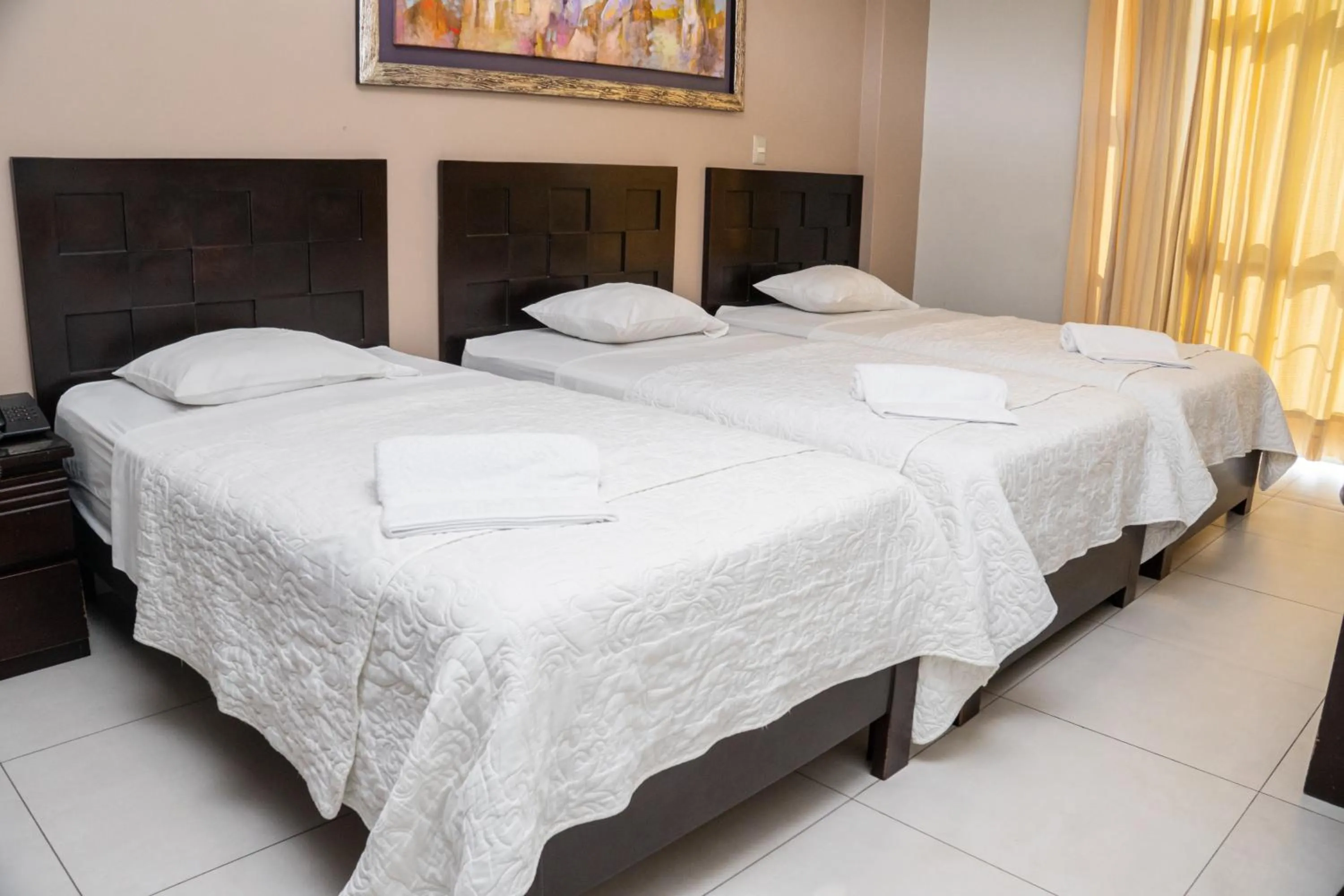 Bed in Cacique Hotel