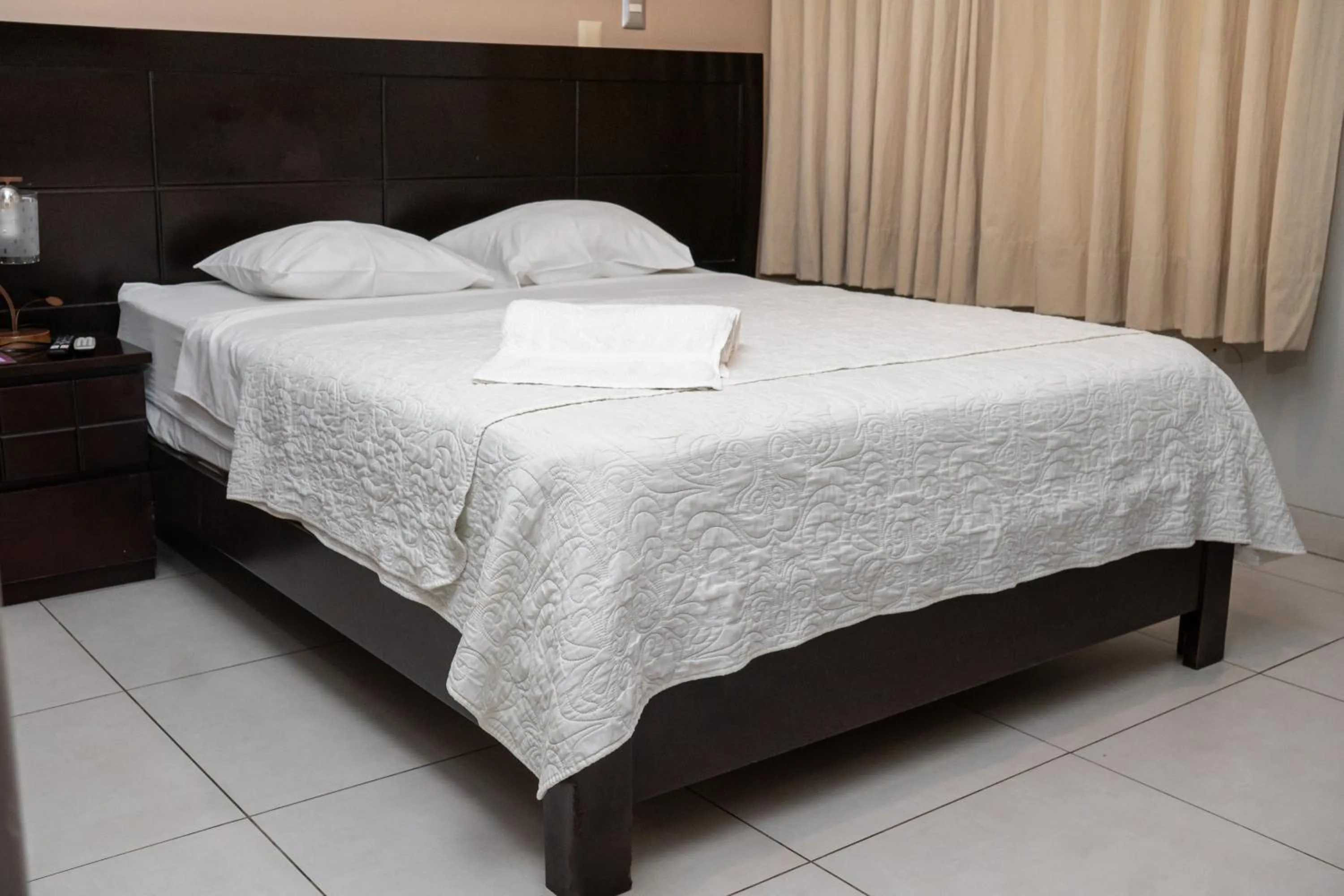 Bed in Cacique Hotel