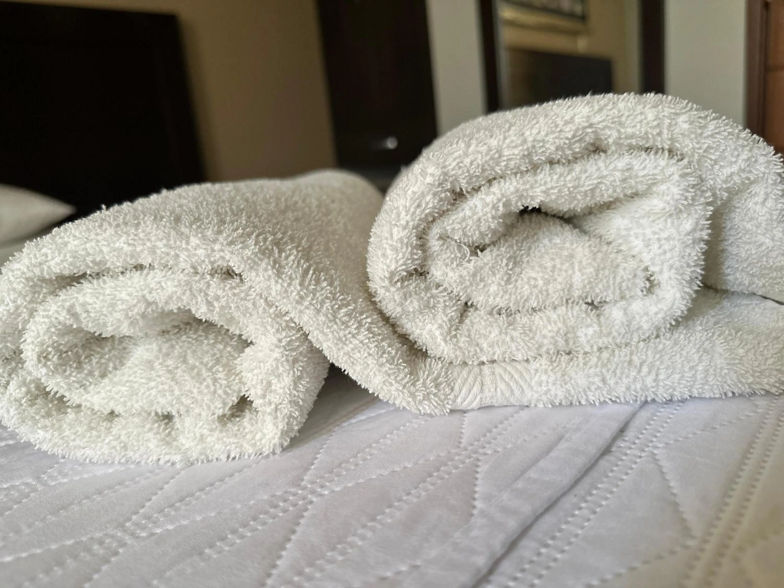 Bed in Cacique Hotel