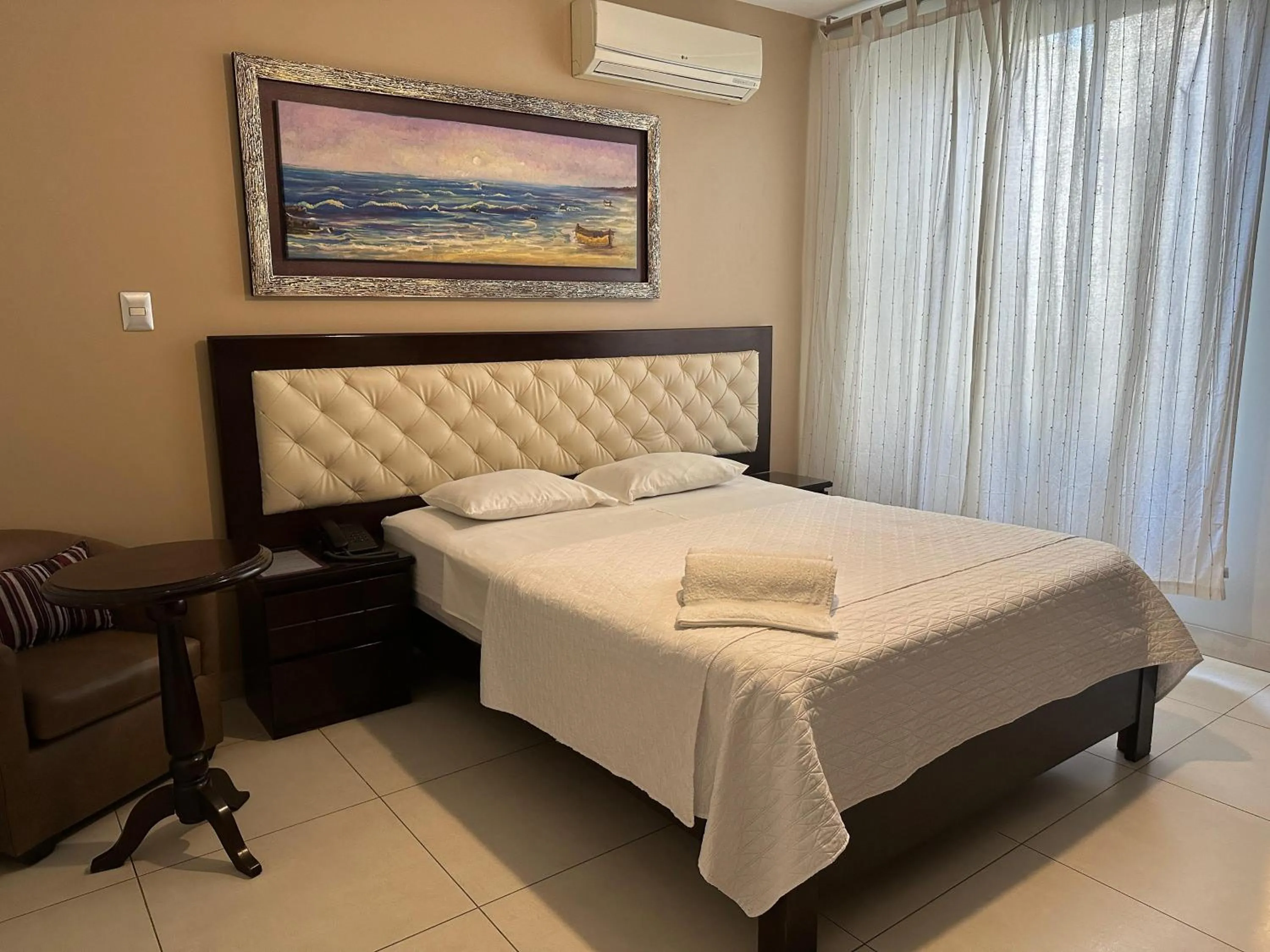 Bed in Cacique Hotel