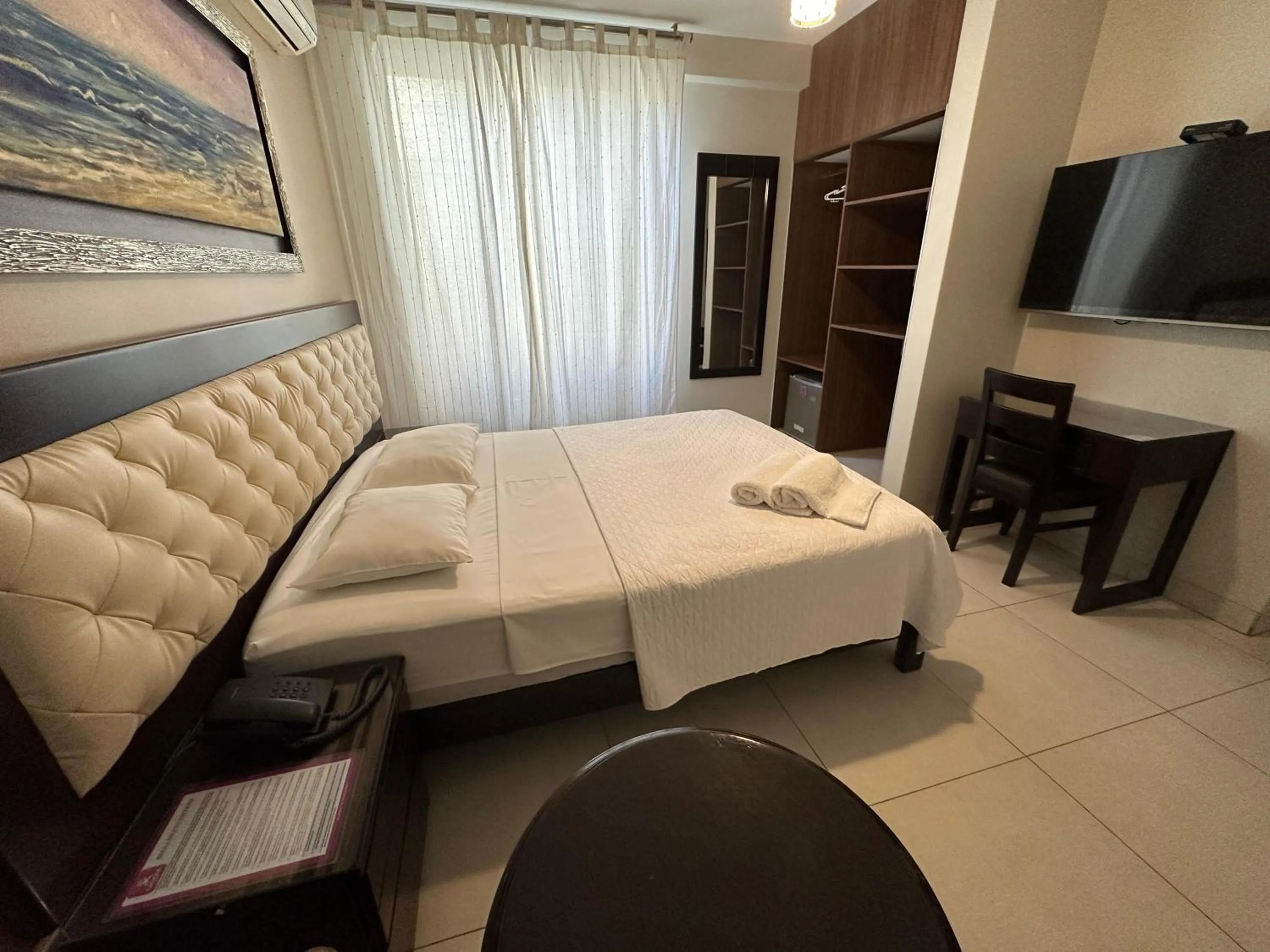 Bed in Cacique Hotel