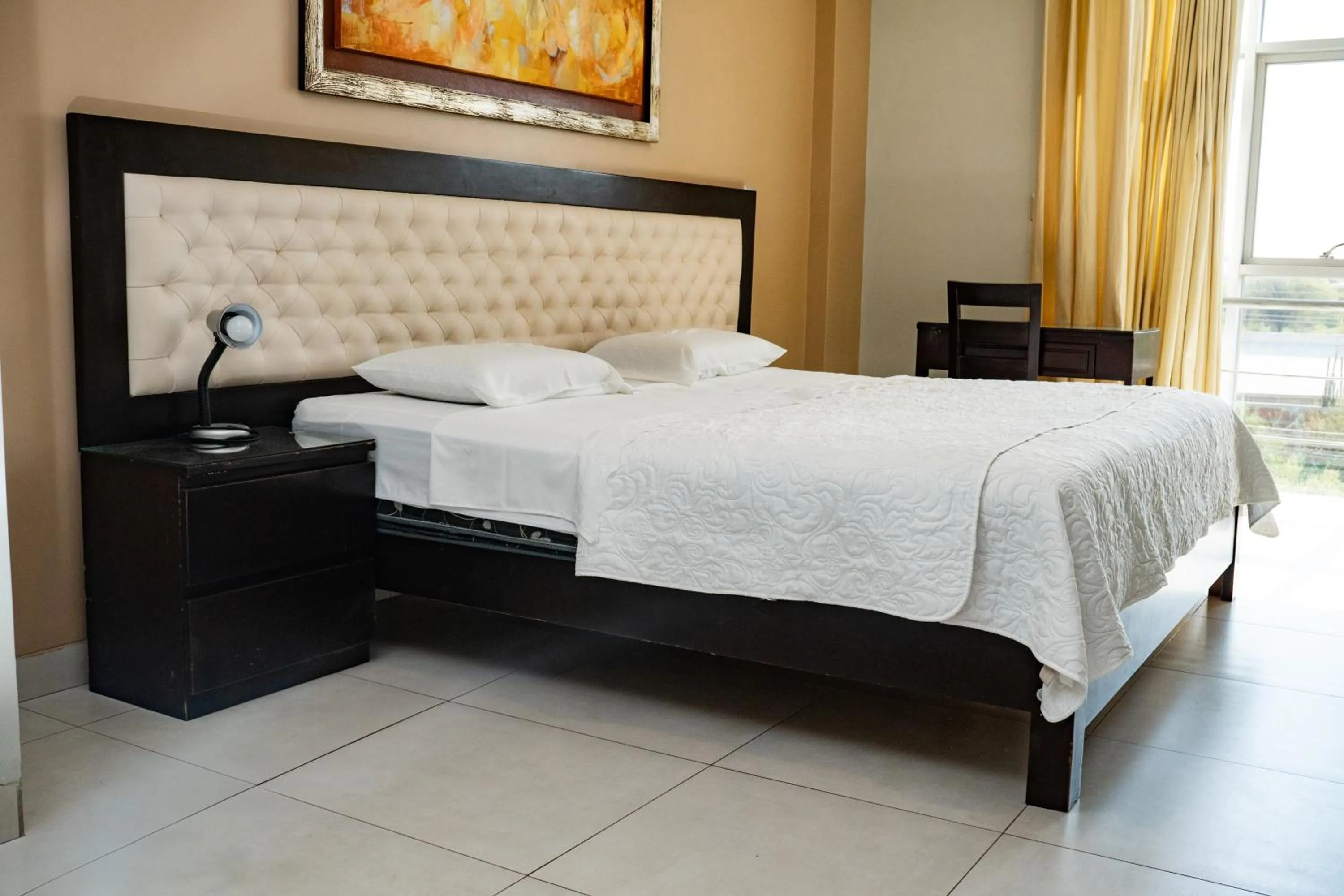 Bed in Cacique Hotel