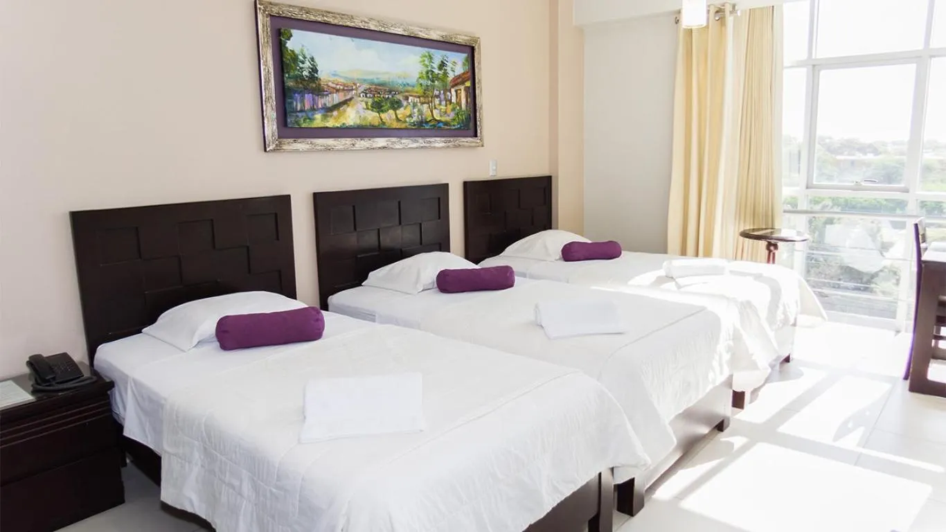 Bed in Cacique Hotel