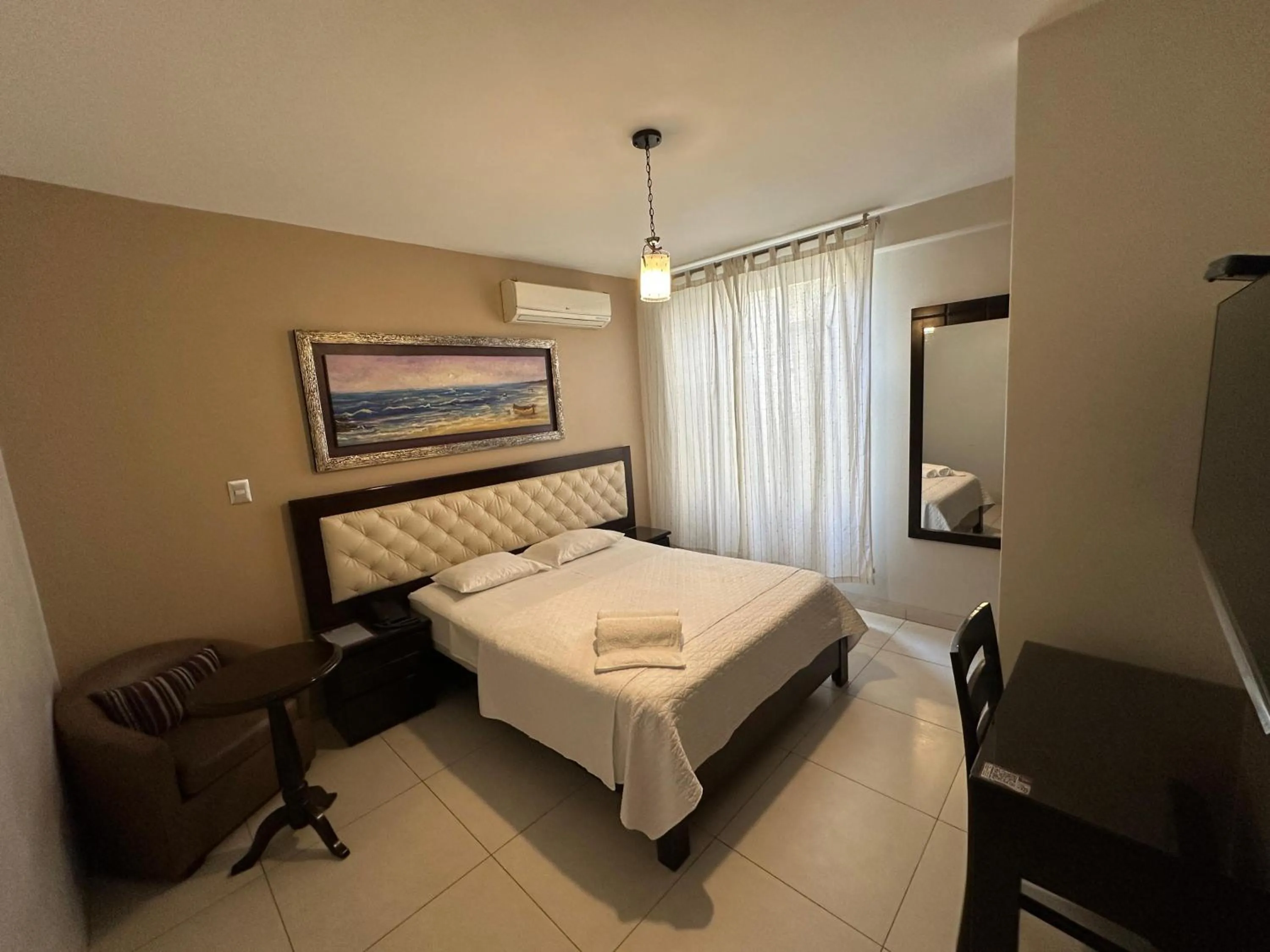 Bed in Cacique Hotel