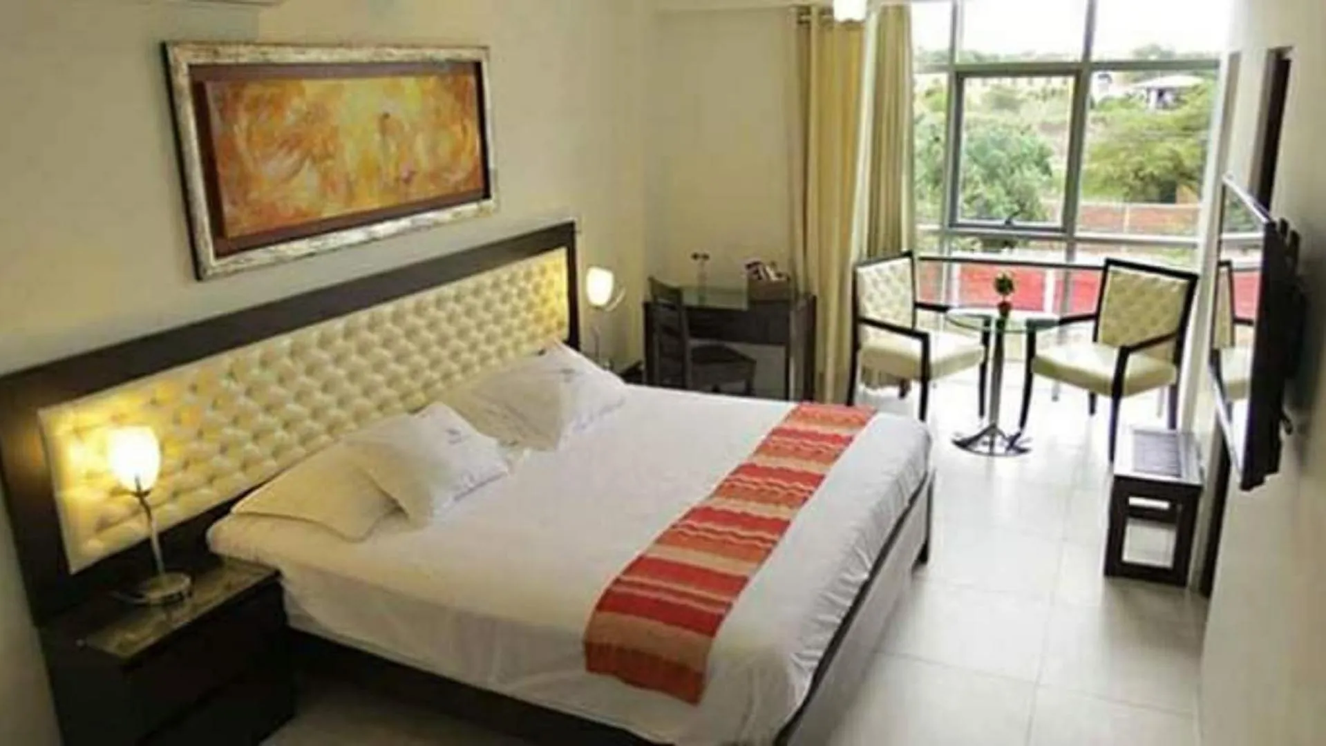 Bed in Cacique Hotel