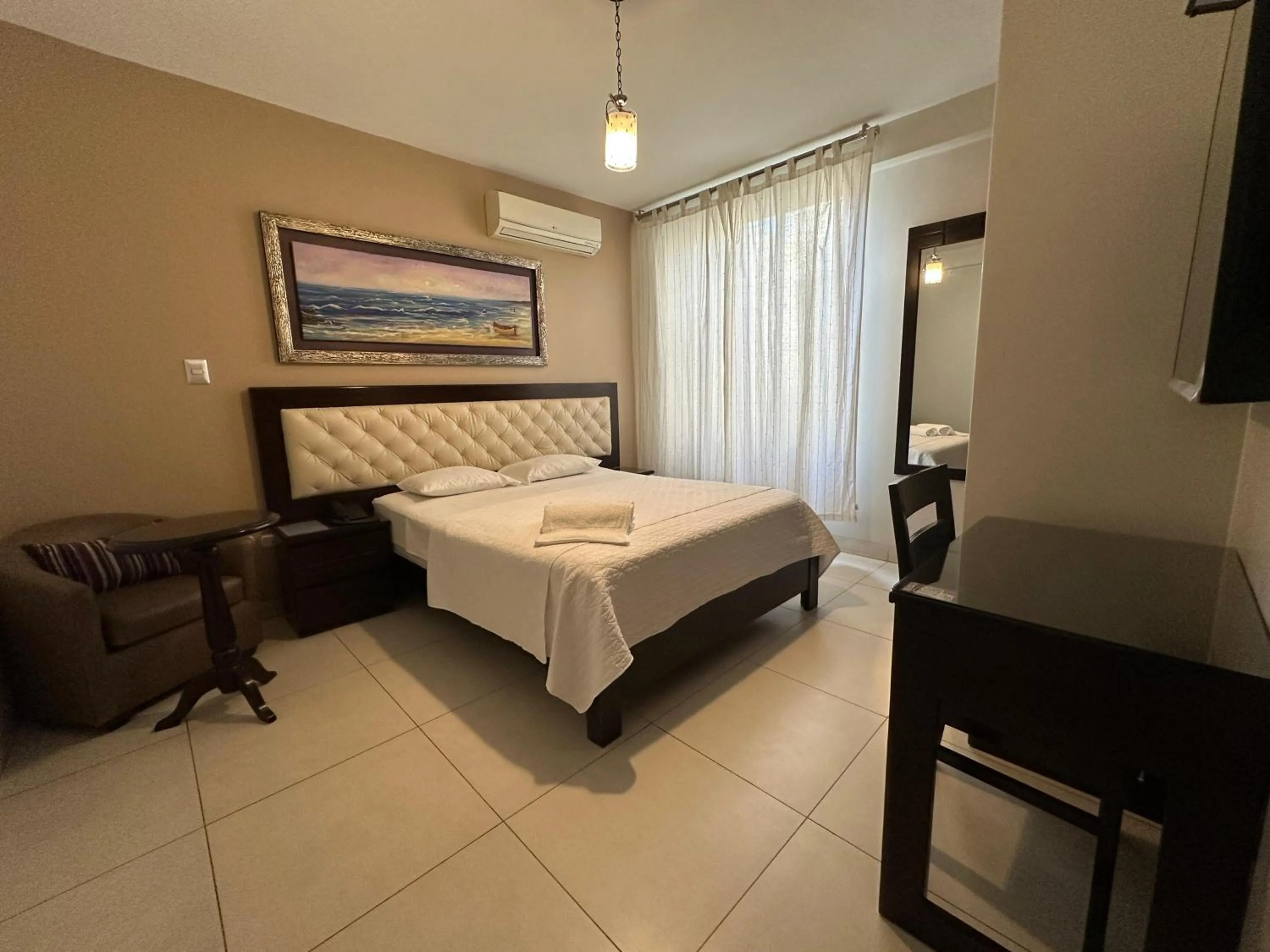 Bed in Cacique Hotel