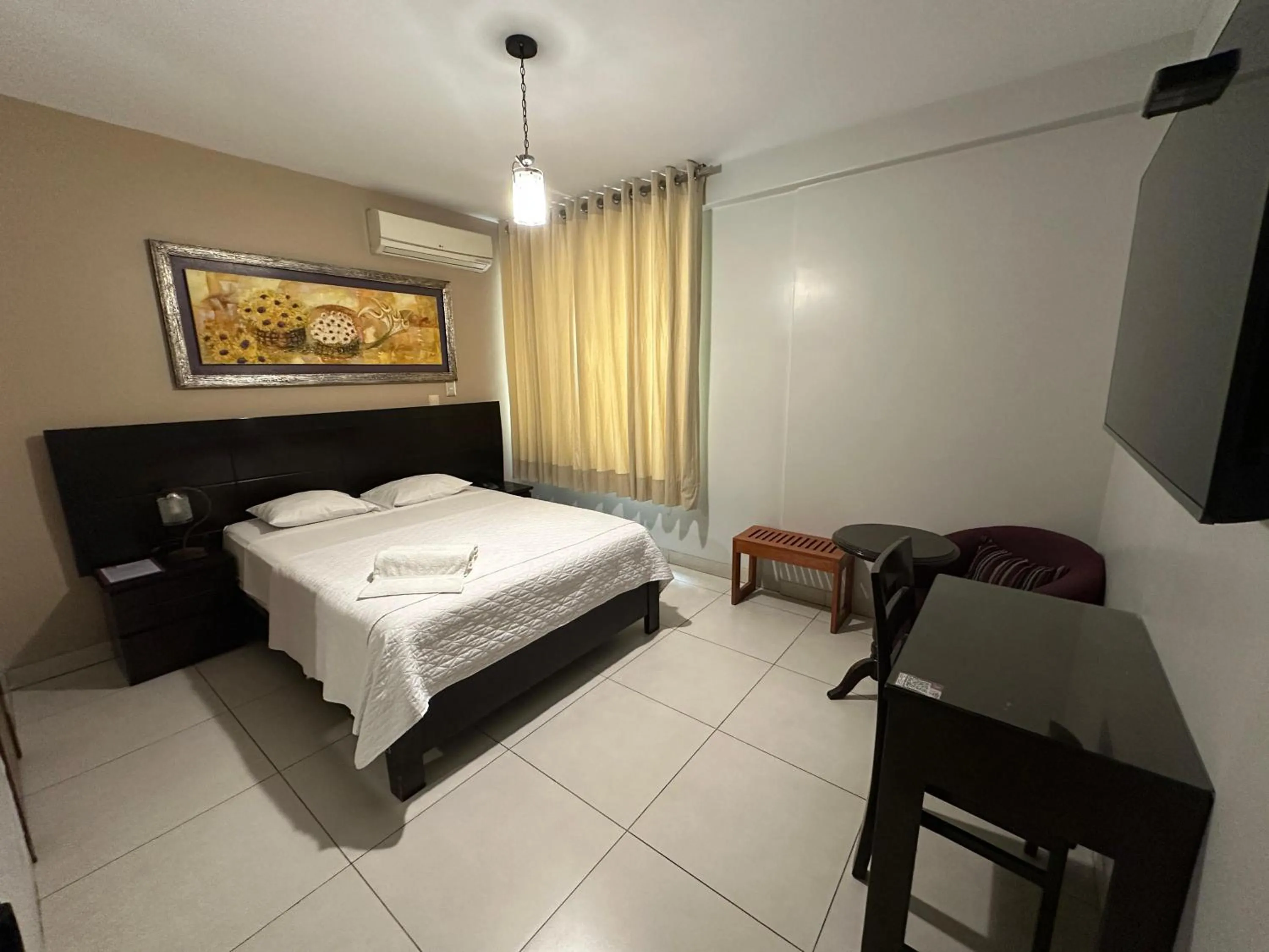 Bed in Cacique Hotel