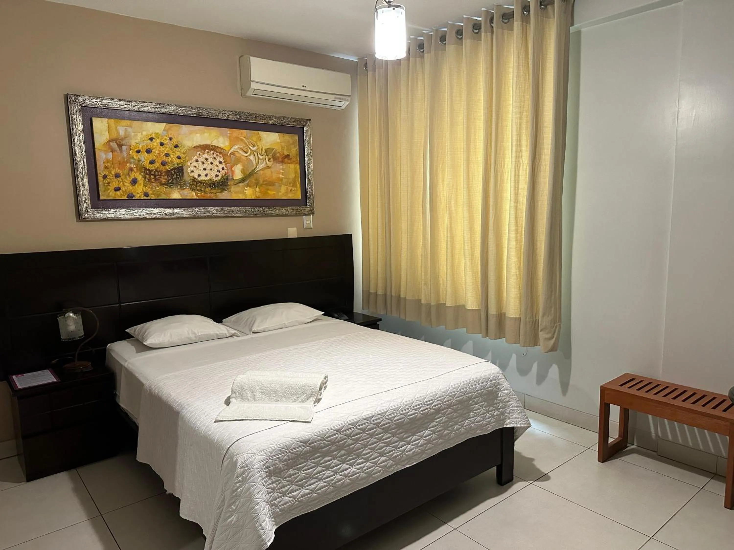 Bed in Cacique Hotel