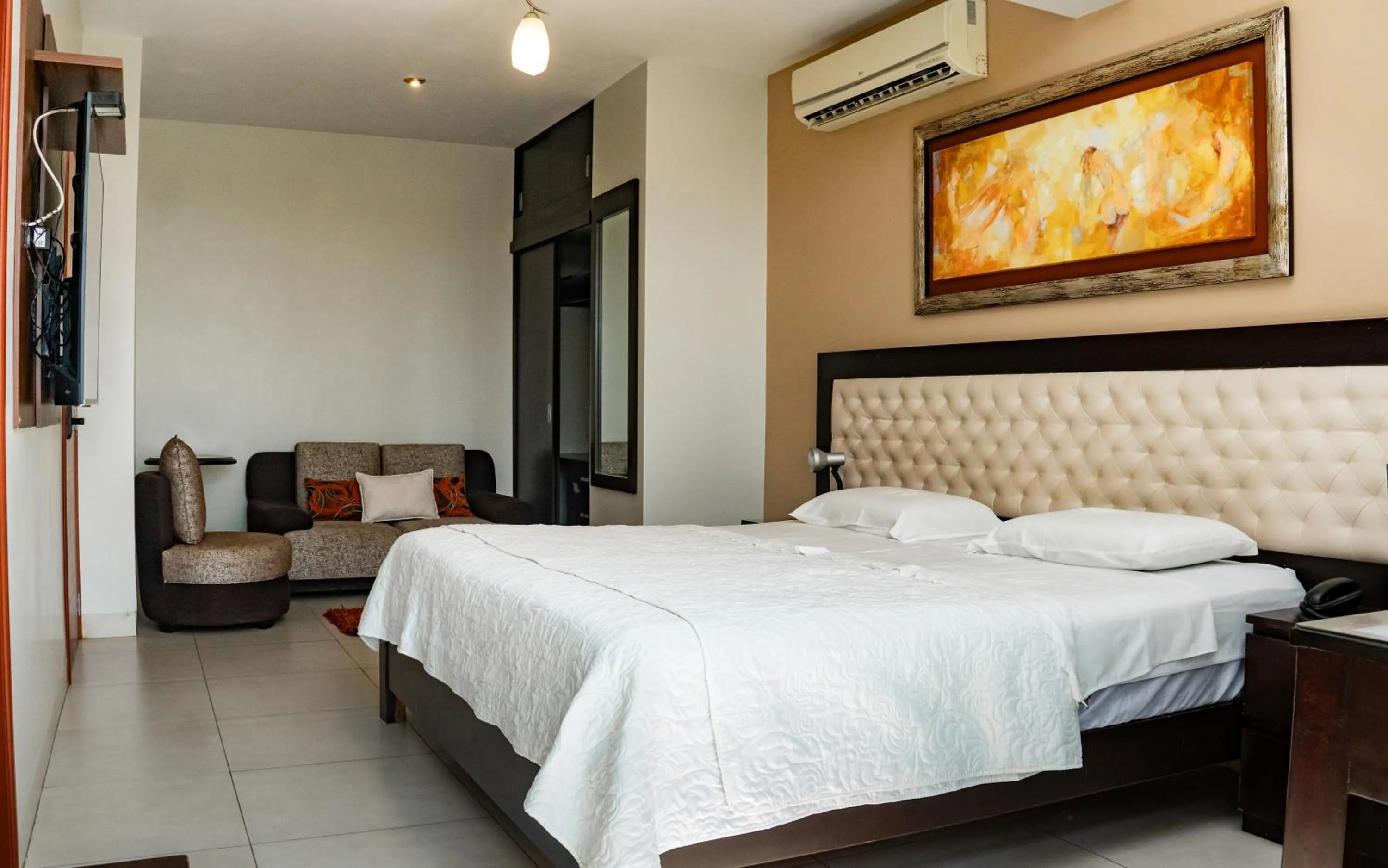 Bed in Cacique Hotel