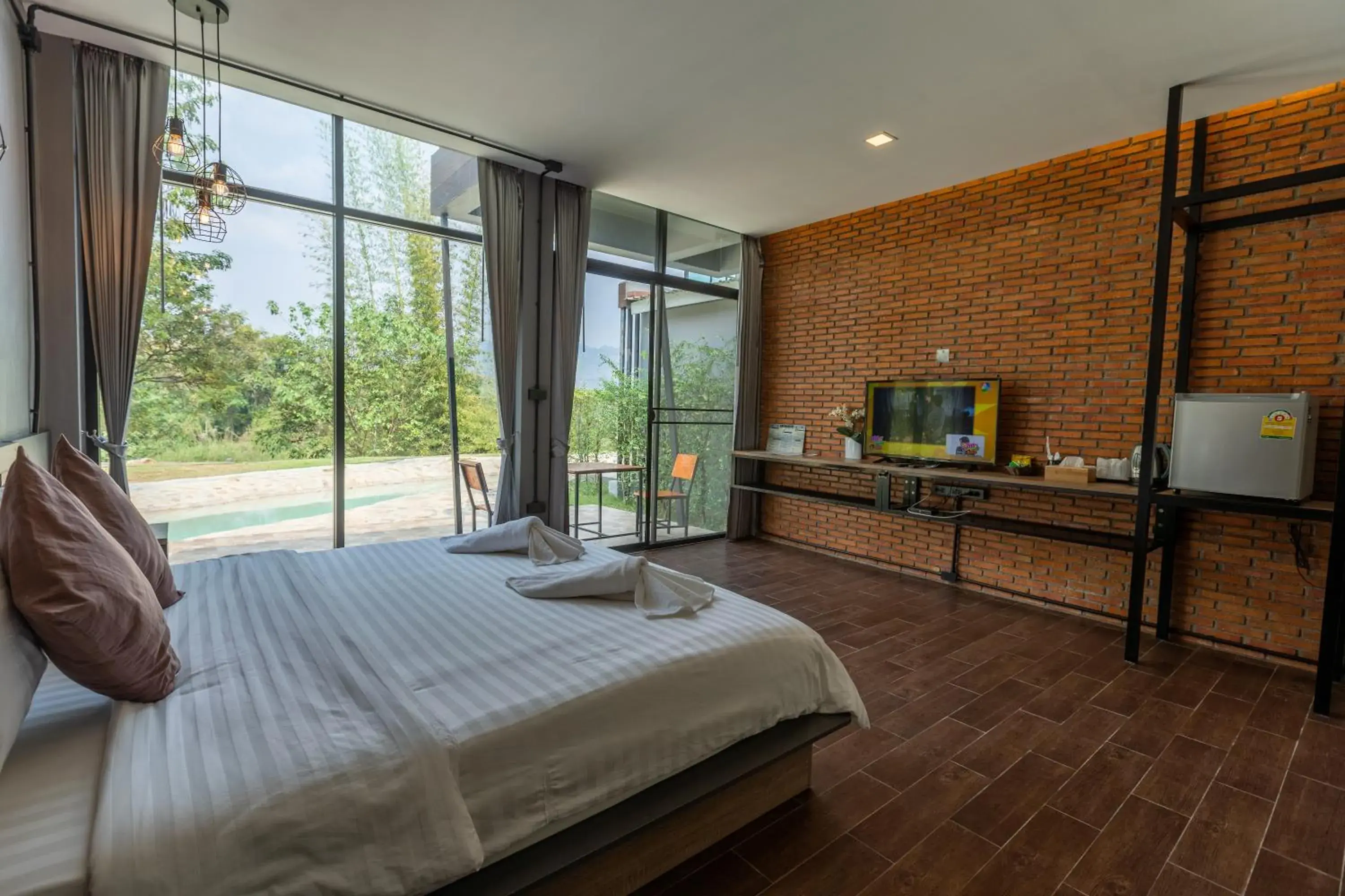 Bed in Kwai Tara Riverside Villas Bed in Kwai Tara Riverside Villas