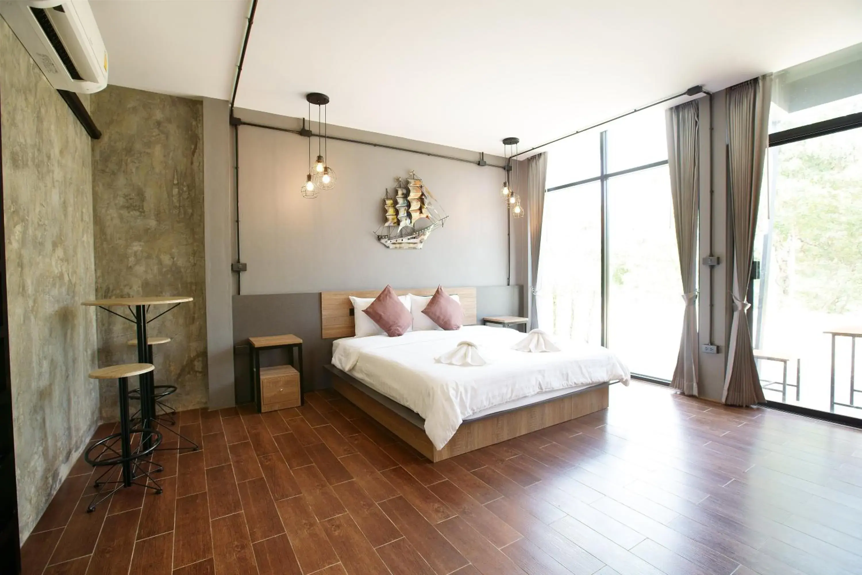 Bed in Kwai Tara Riverside Villas Bed in Kwai Tara Riverside Villas