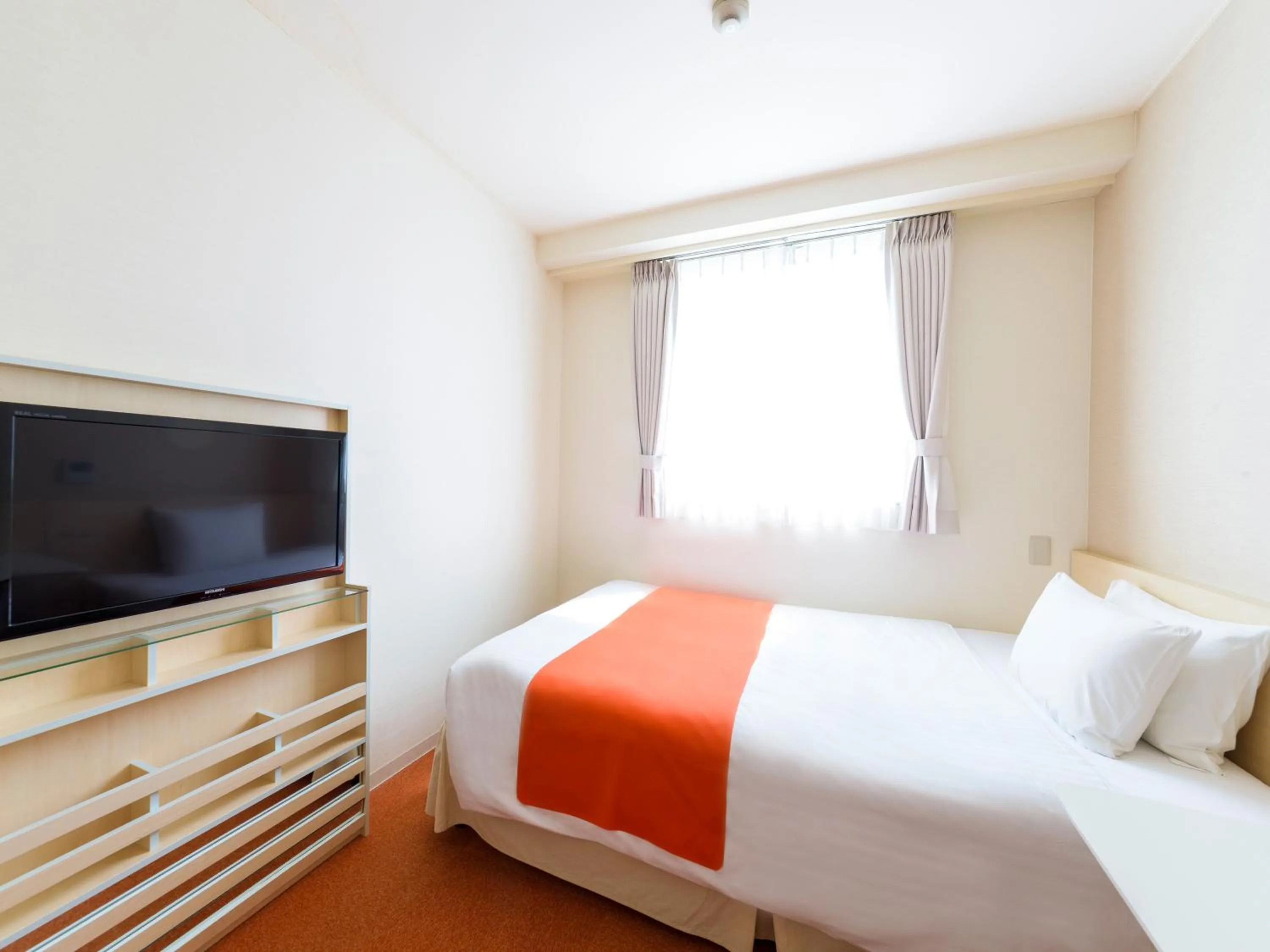 Photo of the whole room, Bed in Hotel Abest Naha Kokusai Street