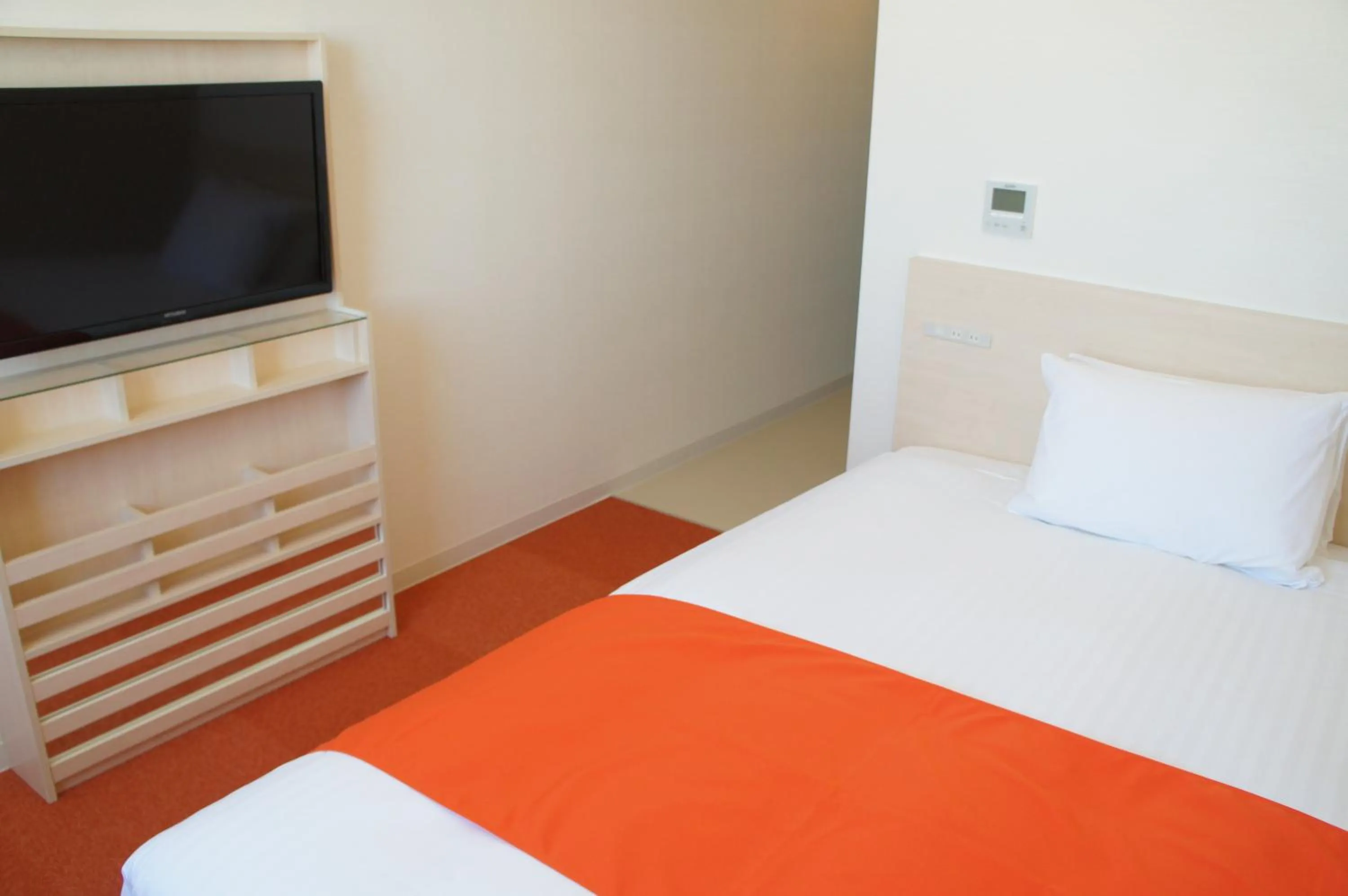 Bed in Hotel Abest Naha Kokusai Street