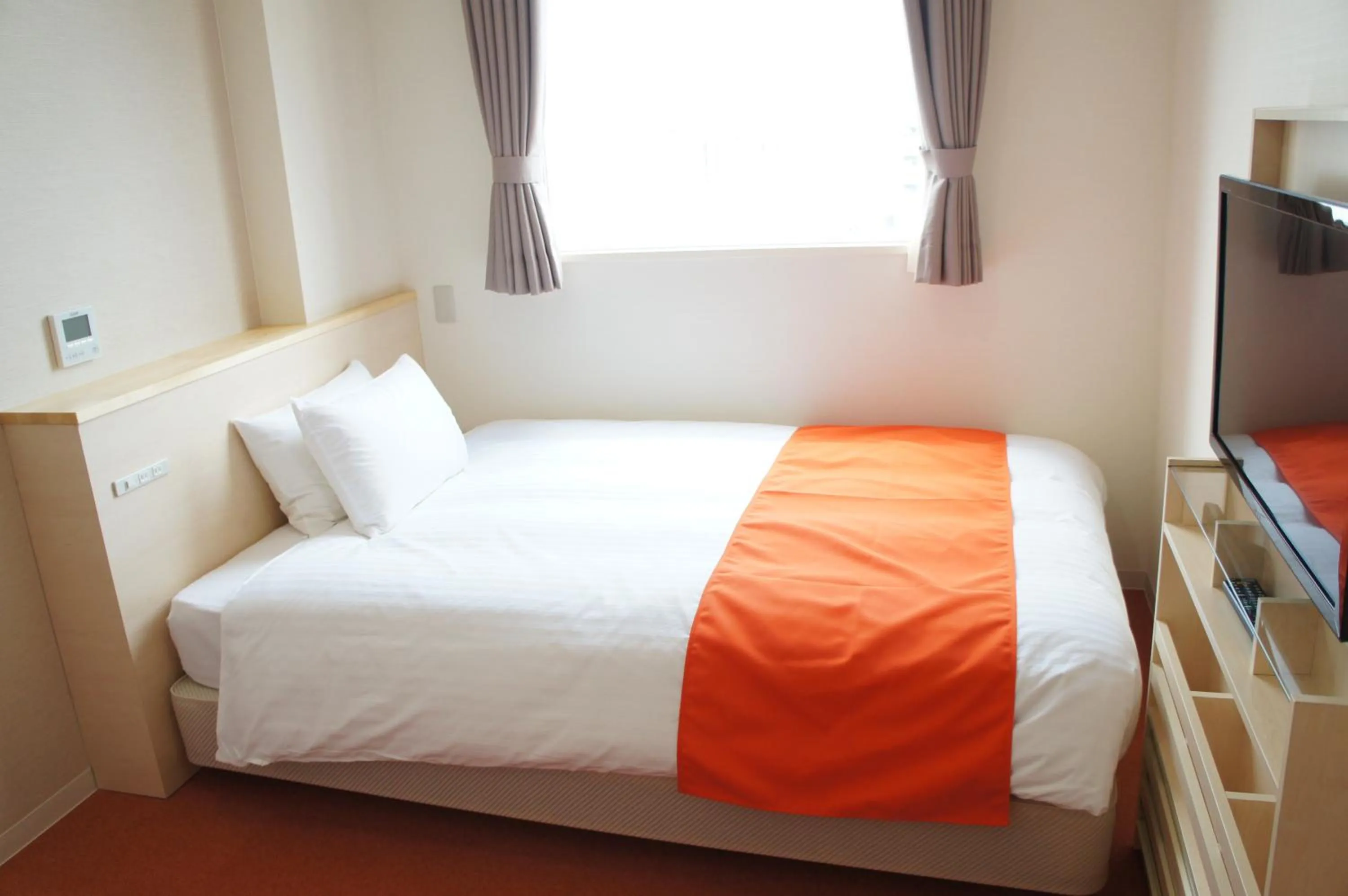 Bed in Hotel Abest Naha Kokusai Street