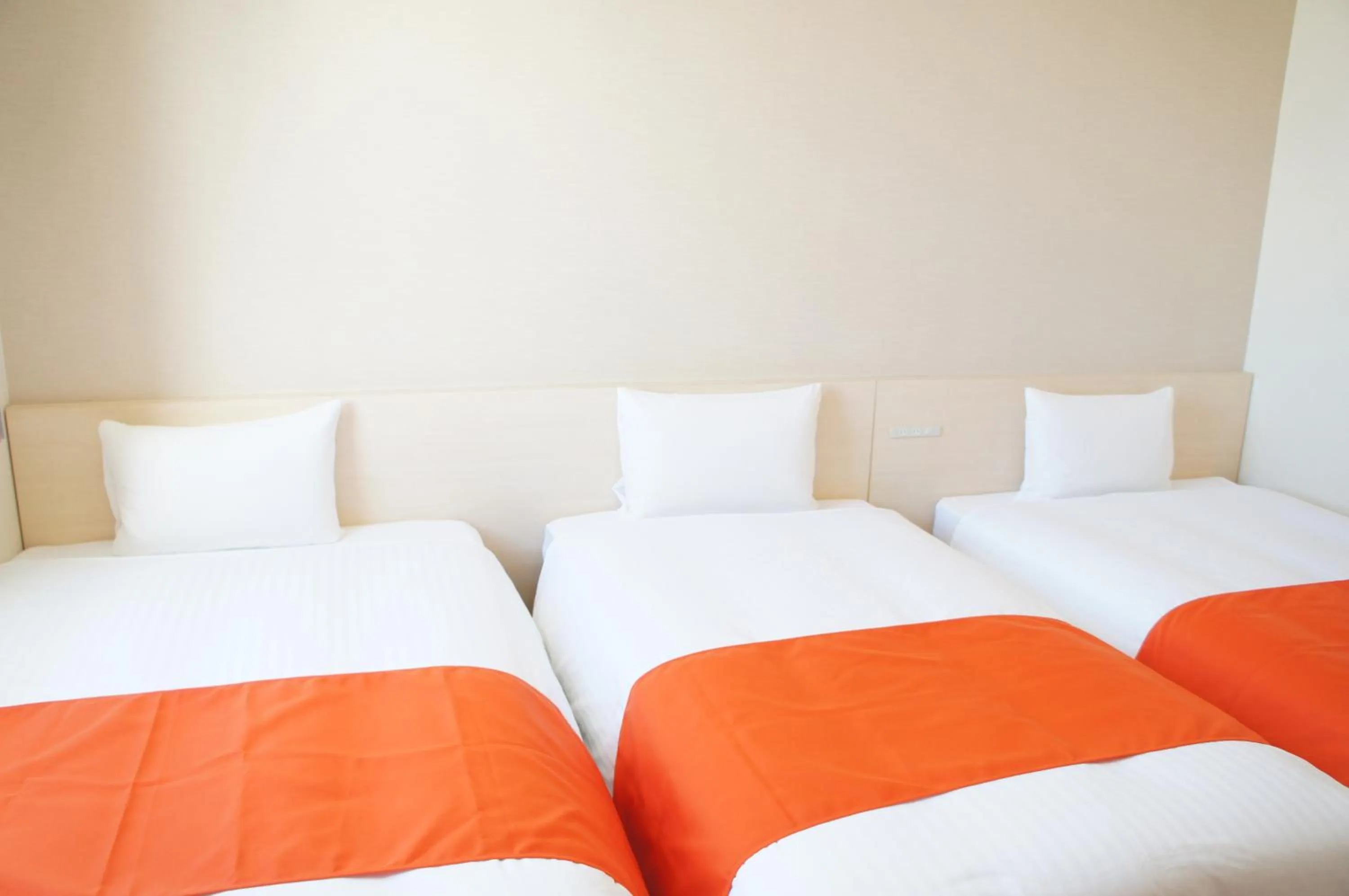 Photo of the whole room, Bed in Hotel Abest Naha Kokusai Street